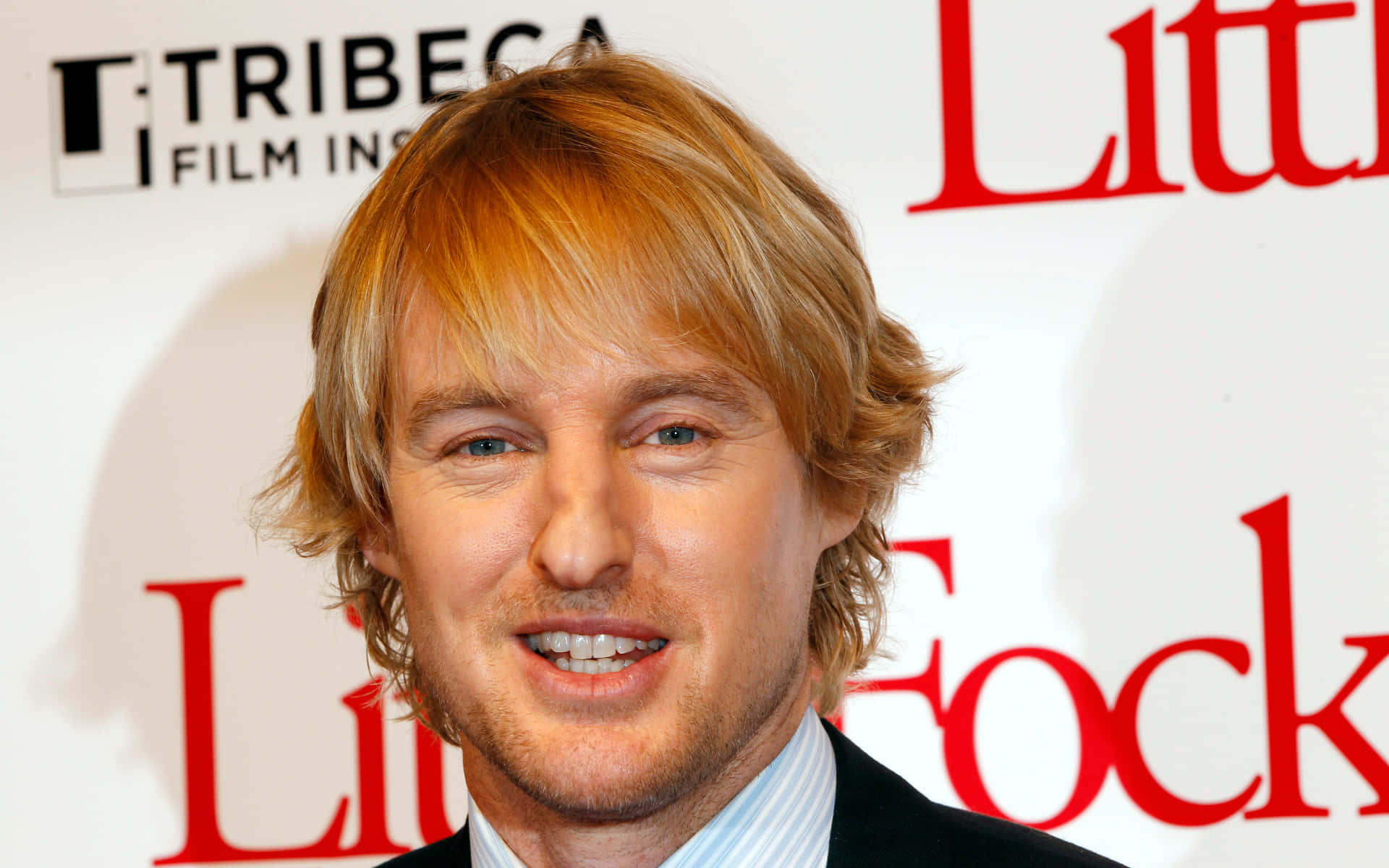Actor Owen Wilson Smiles For The Camera Background