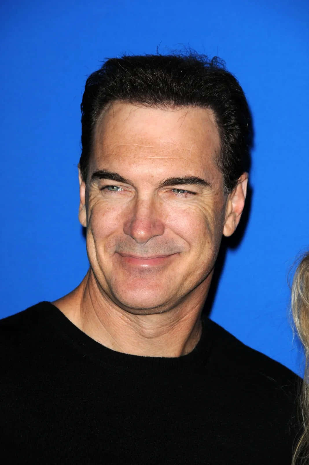 Actor Patrick Warburton Attends A Red Carpet Event Background