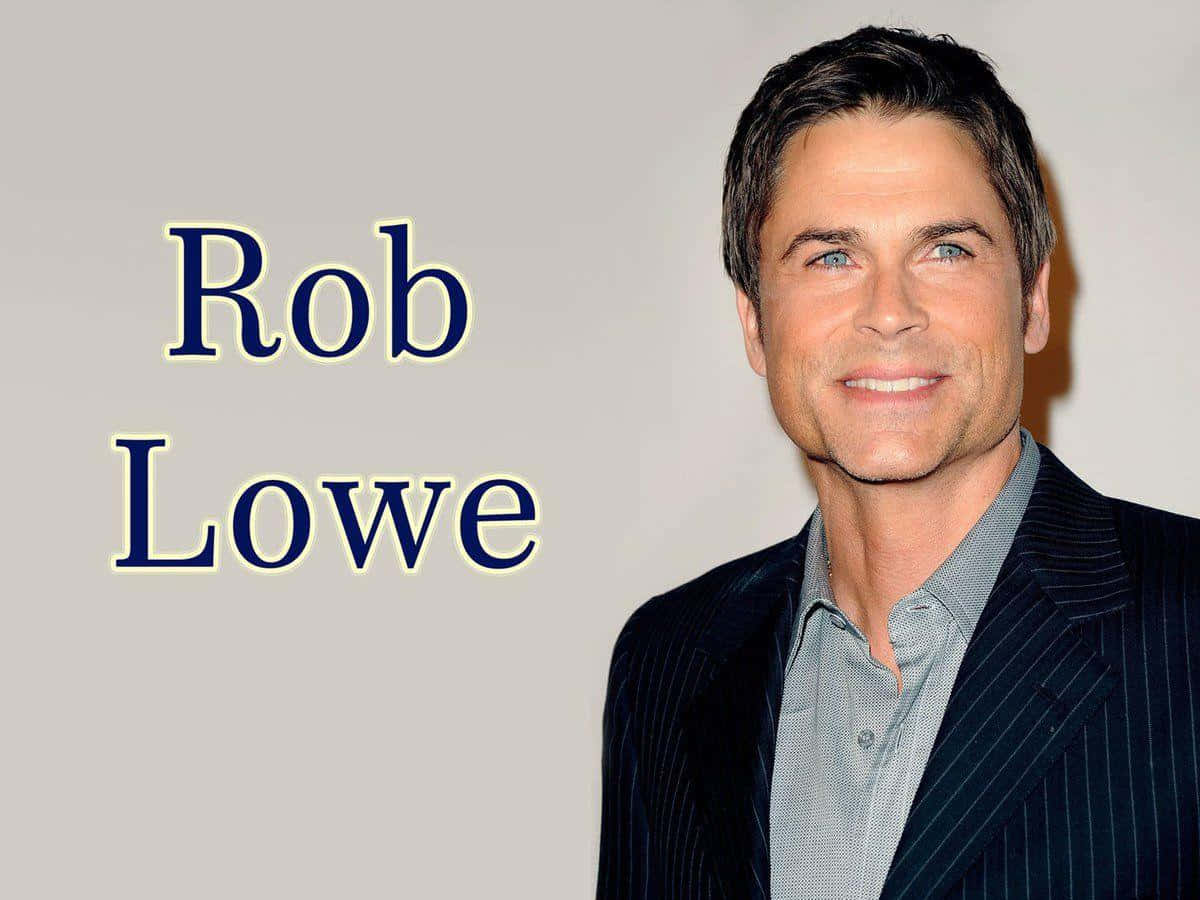 Actor Rob Lowe Looks Directly At The Camera At A Press Event Background