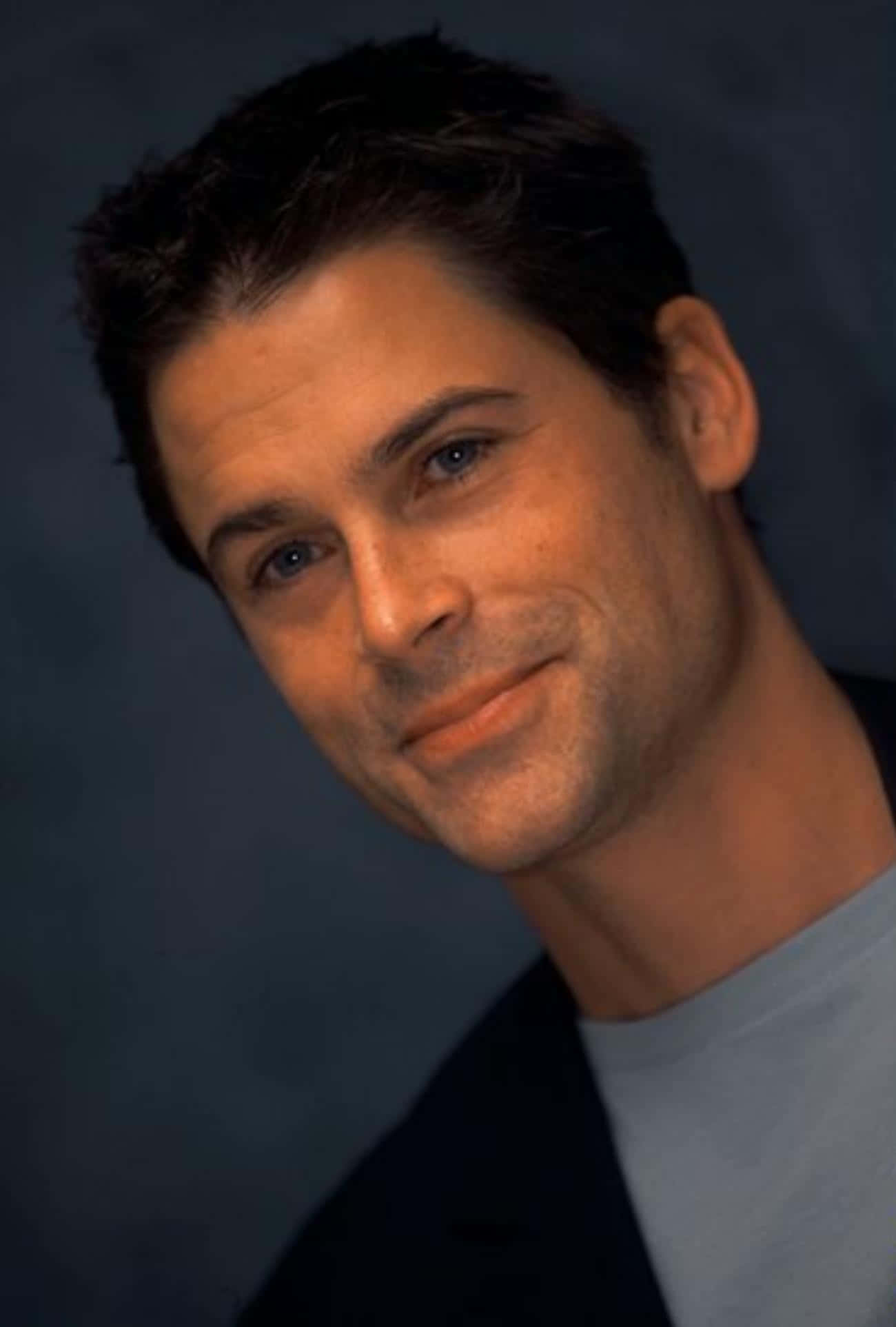 Actor Rob Lowe Poses For A Photo Background