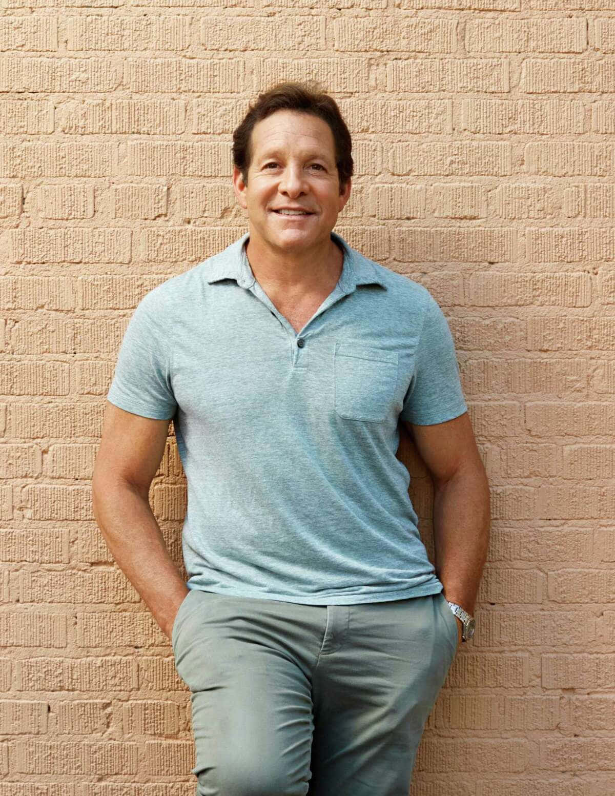 Actor Steve Guttenberg Posing Background