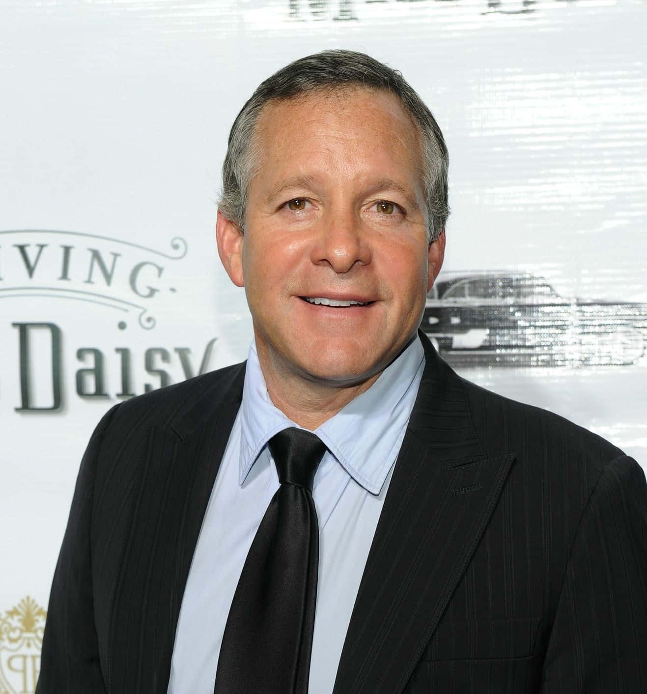 Actor Steve Guttenberg Smiles For The Camera Background