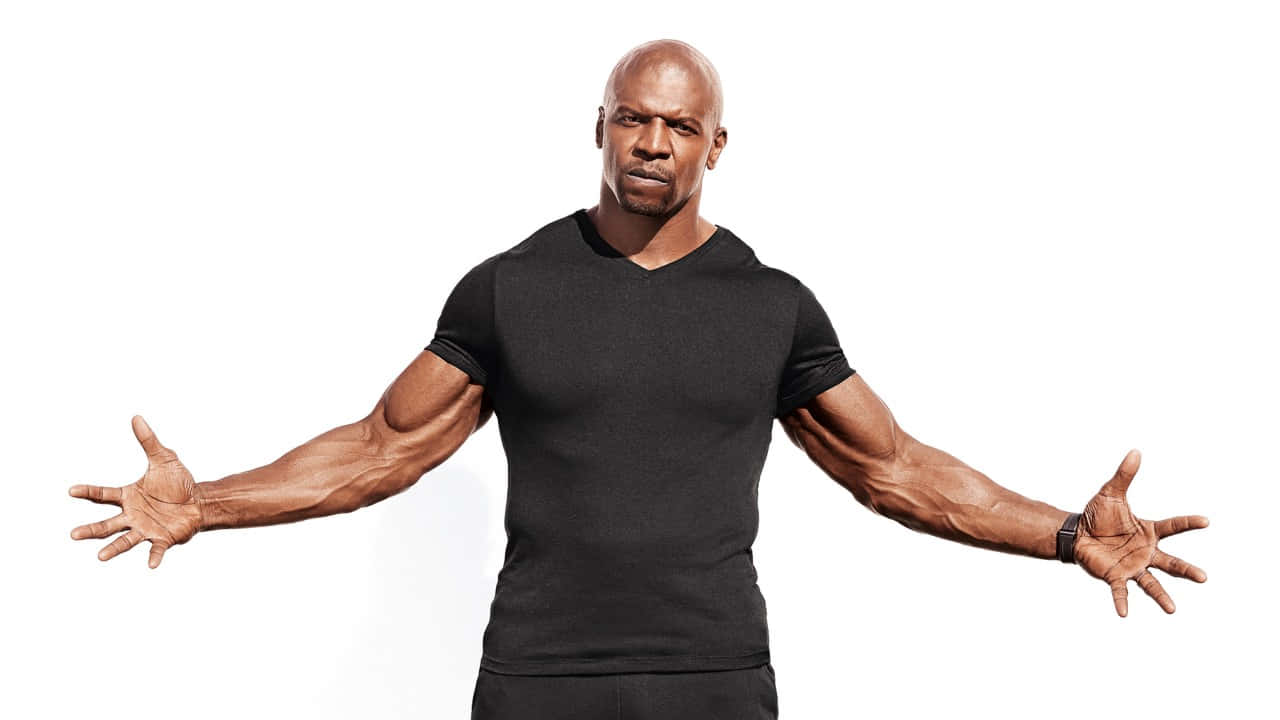 Actor Terry Crews Posing In A Tuxedo Background
