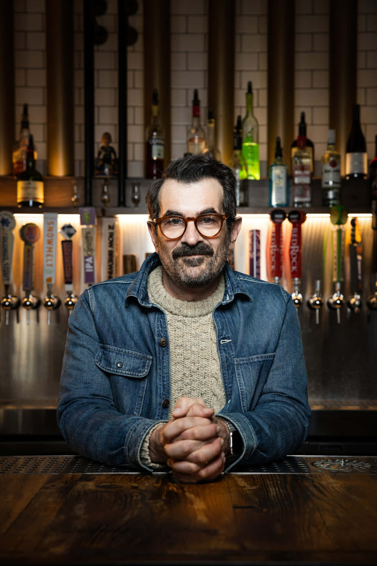 Actor Ty Burrell Smiling In A Formal Attire Background