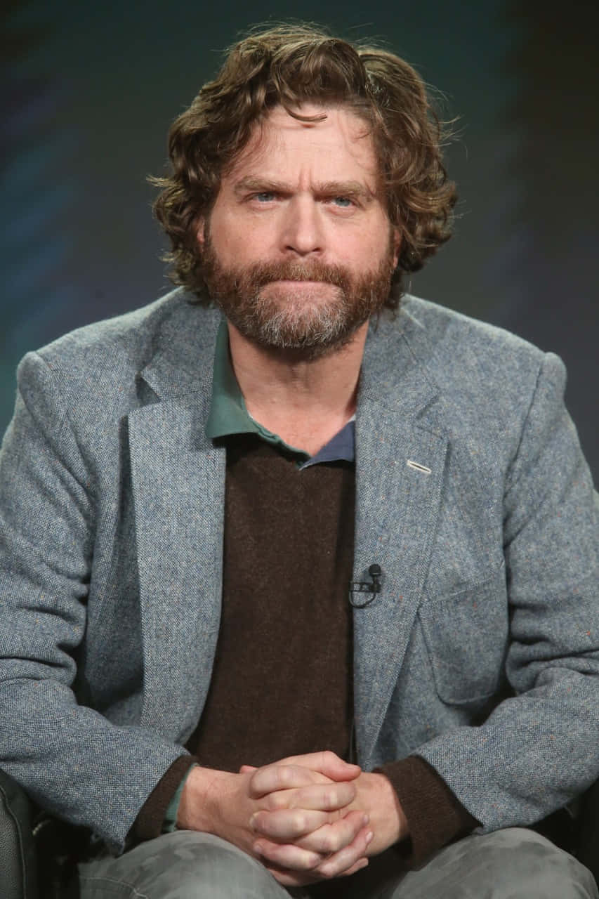 Actor Zach Galifianakis Poses For A Photo. Background