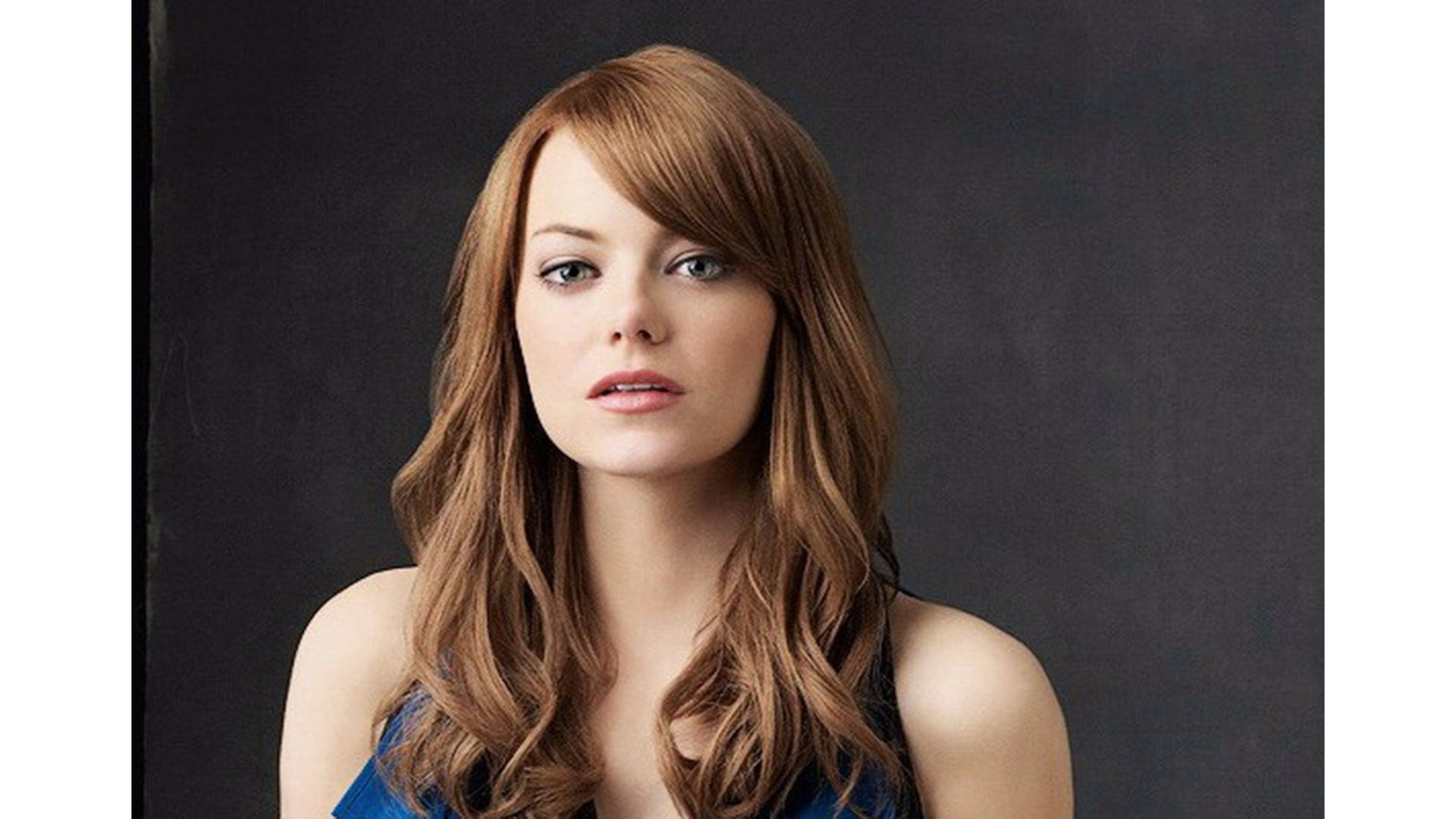 Actress Emma Stone In Her Famed Movie Easy A Background