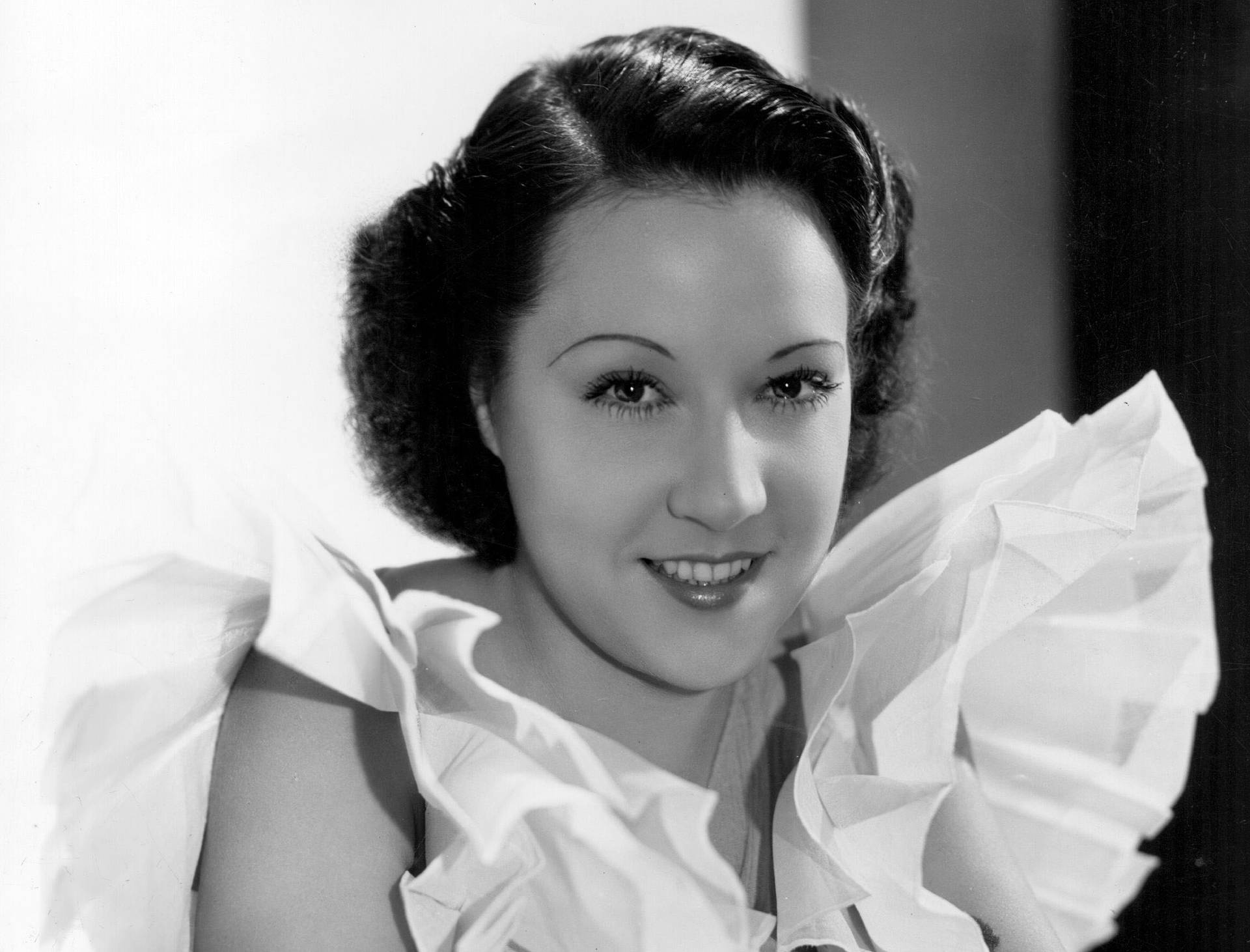 Actress Ethel Merman In White Ruffles Dress