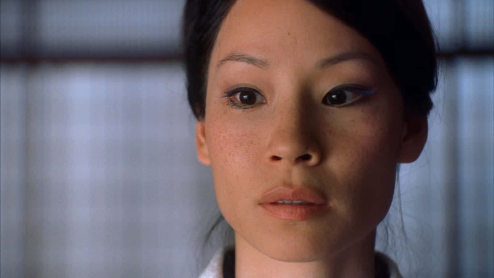 Actress Lucy Liu Goes For A Classic Look. Background