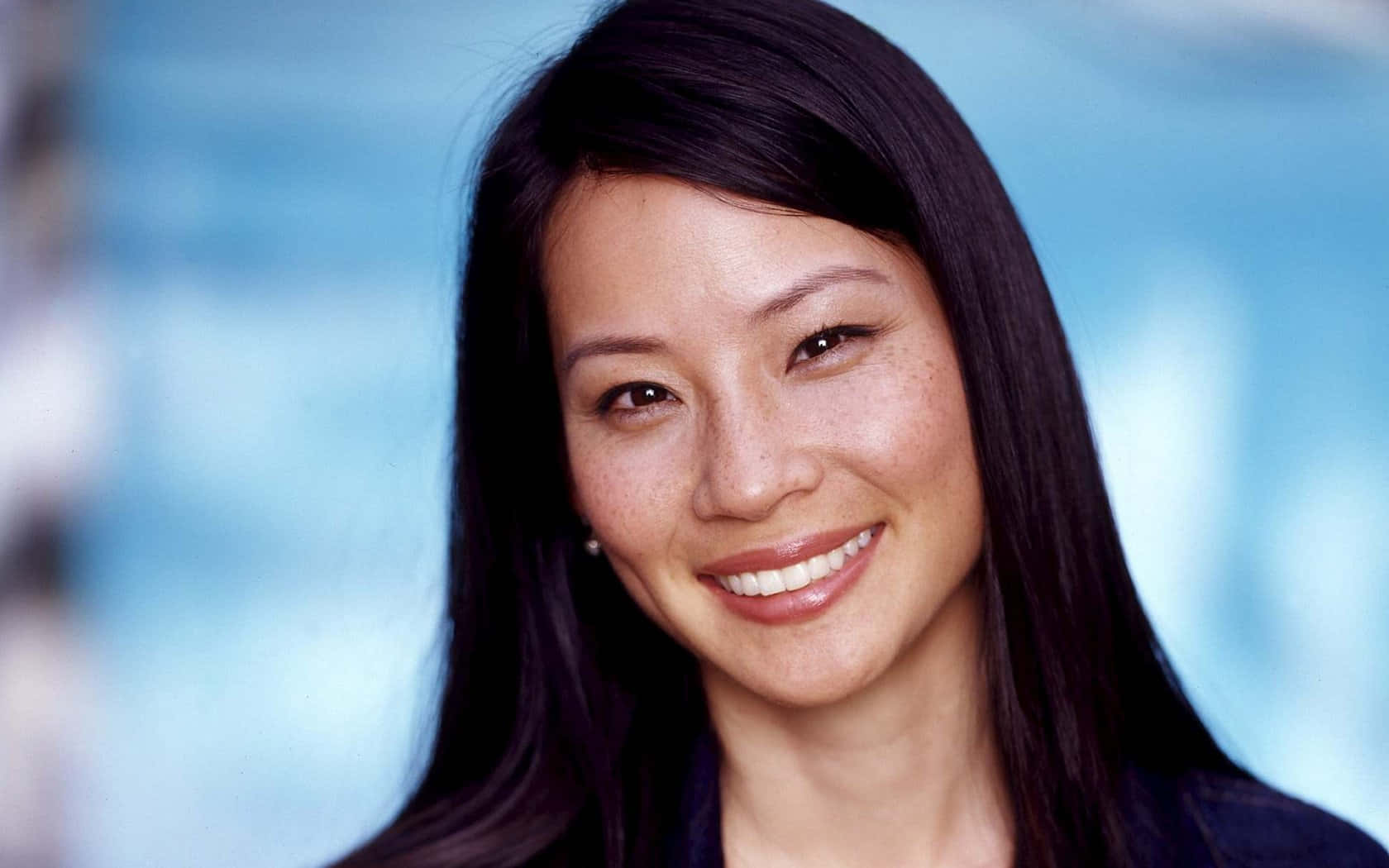 Actress Lucy Liu Smilling Background