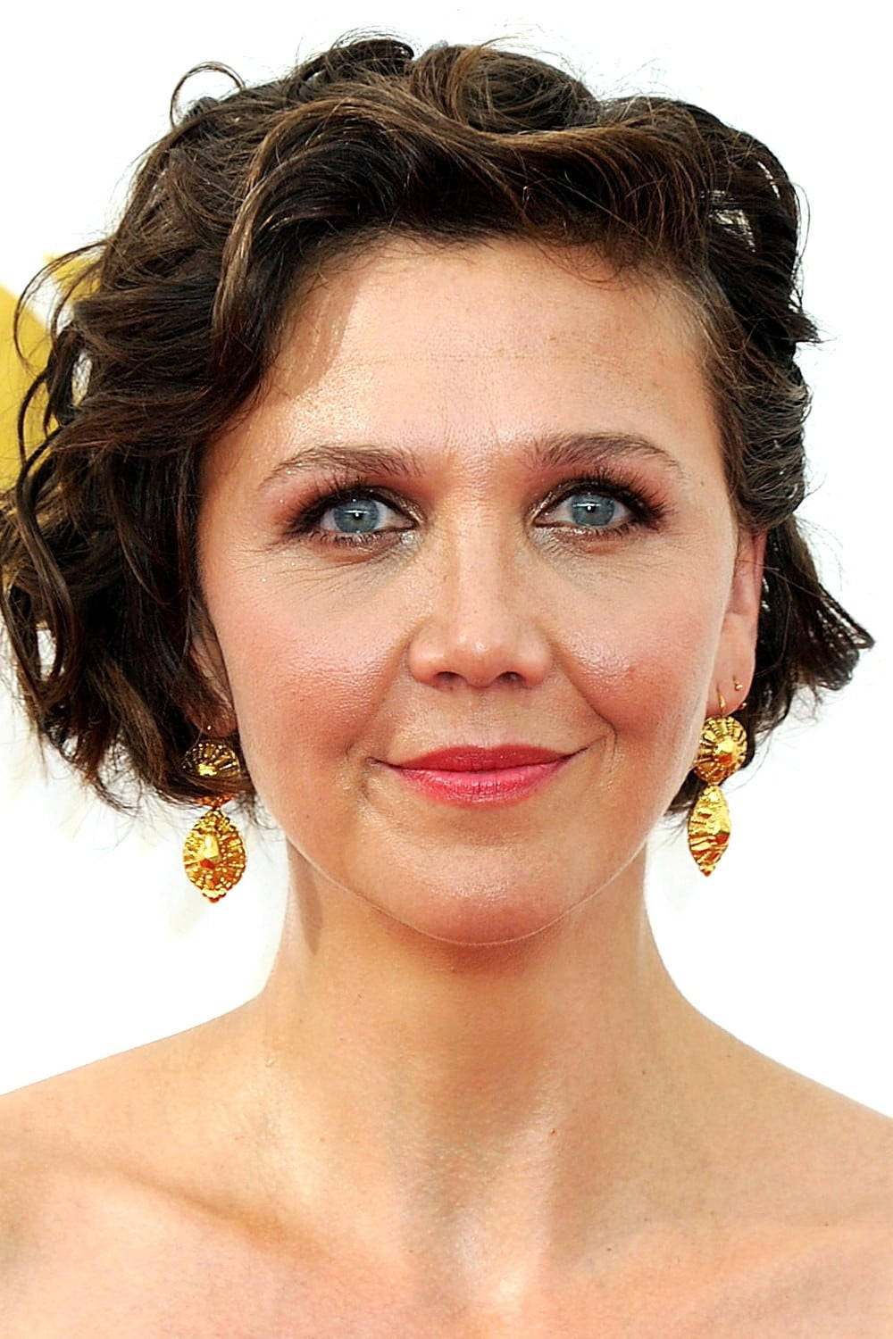 Actress Maggie Gyllenhaal Smiling Background