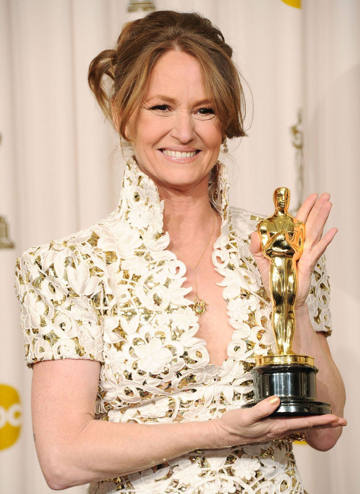 Actress Melissa Leo Smile In Oscar Awards Background