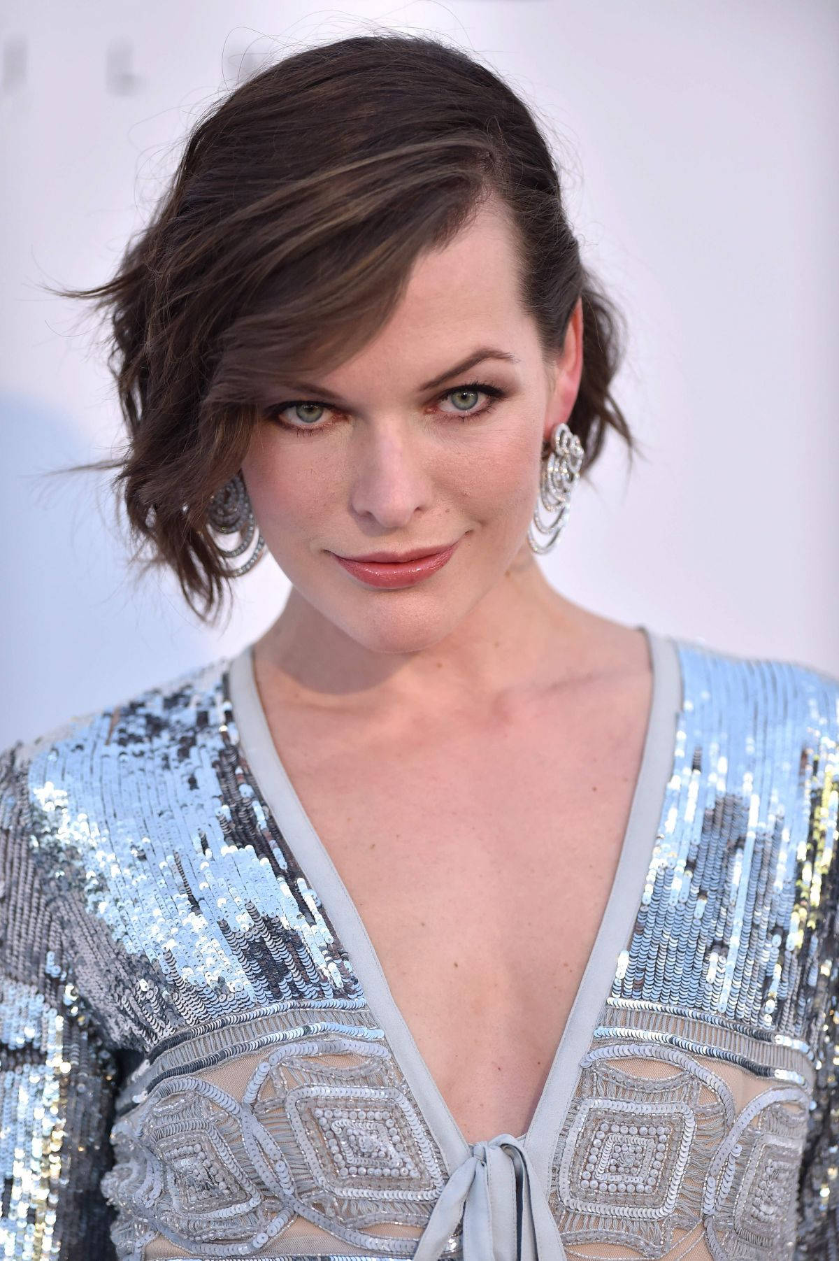 Actress Milla Jovovich Silver Gown Red Carpet
