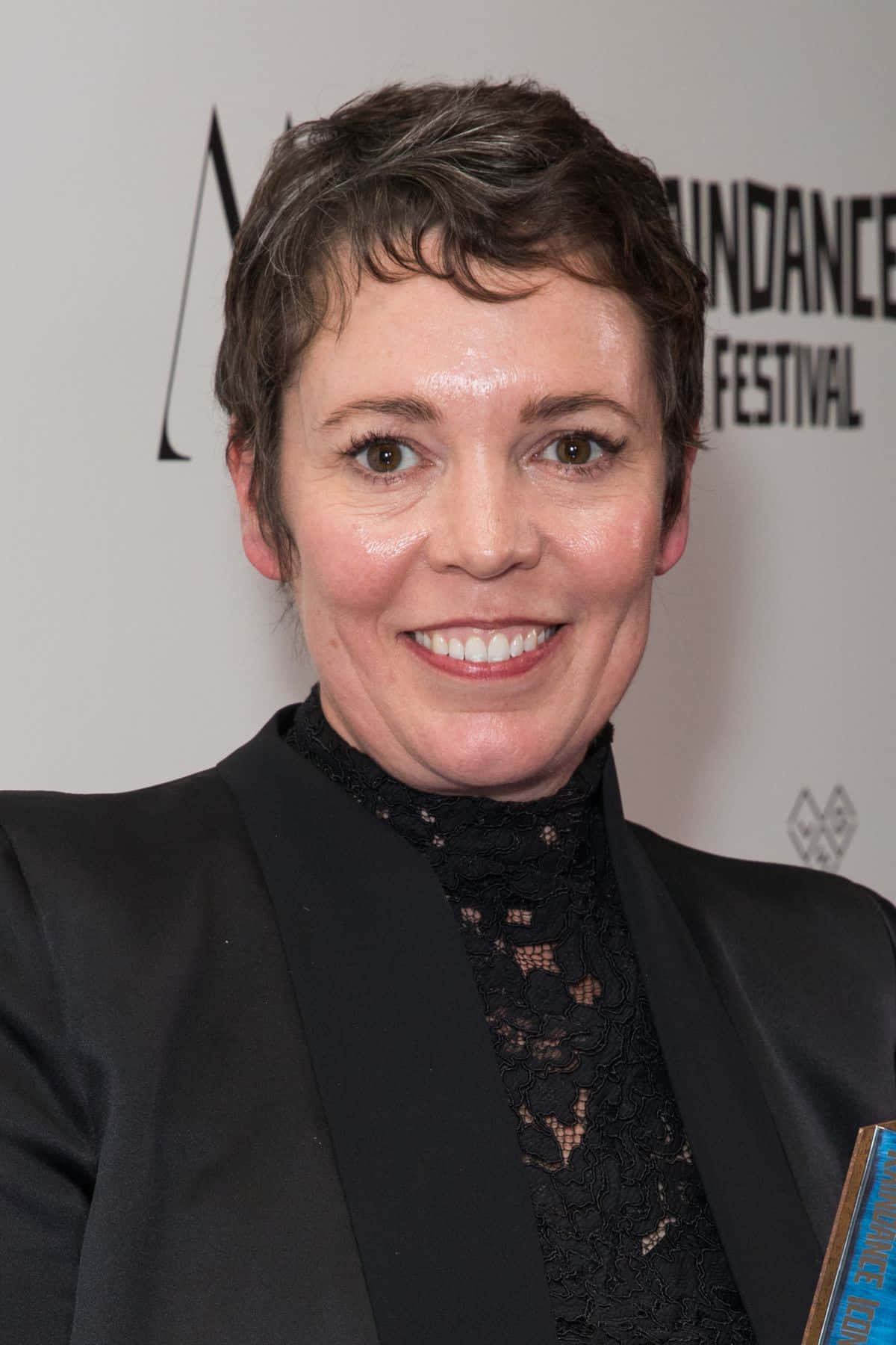 Actress Olivia Colman Sparkly In Purple Gown