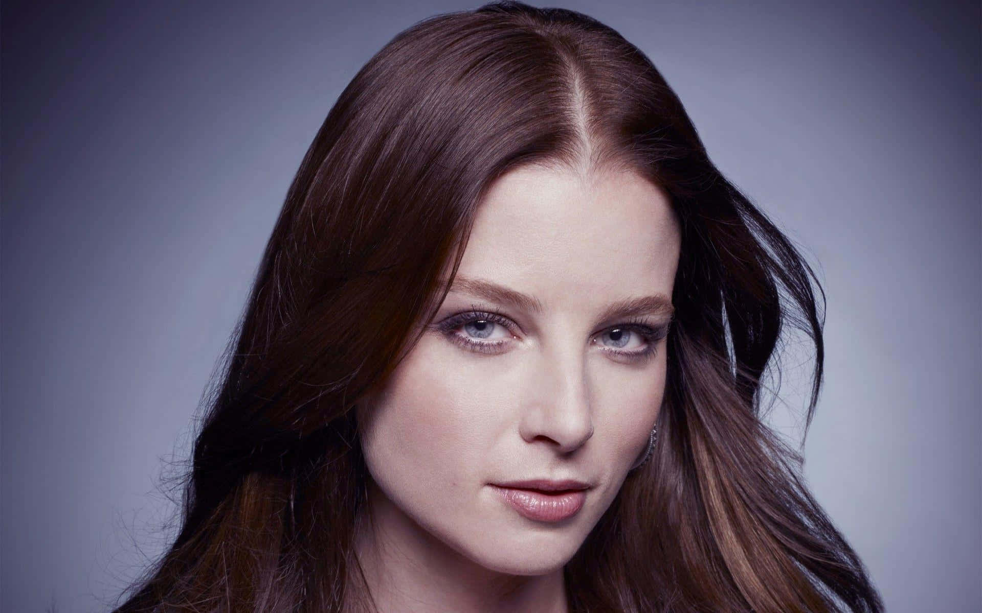 Actress Rachel Nichols Posing For The Camera Background