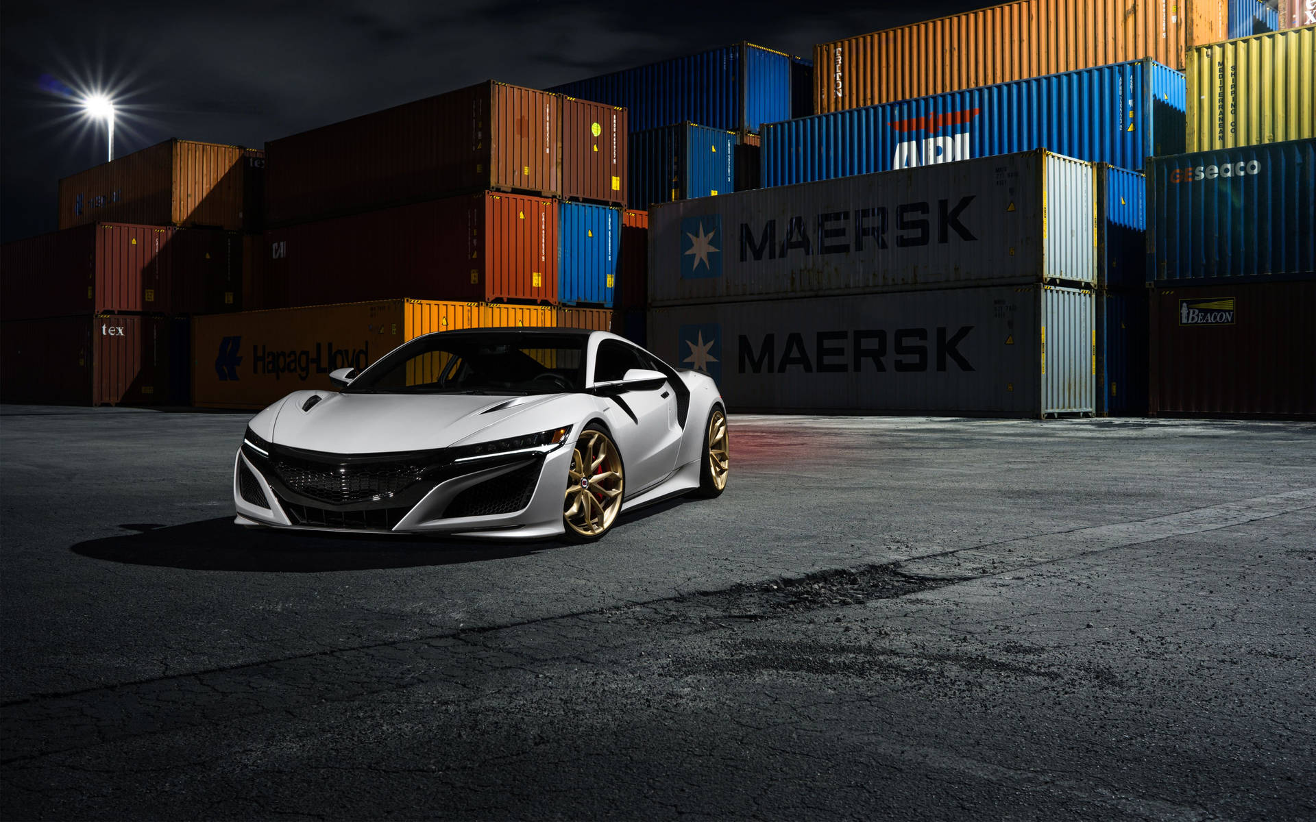 Acura Car And Metal Container Background