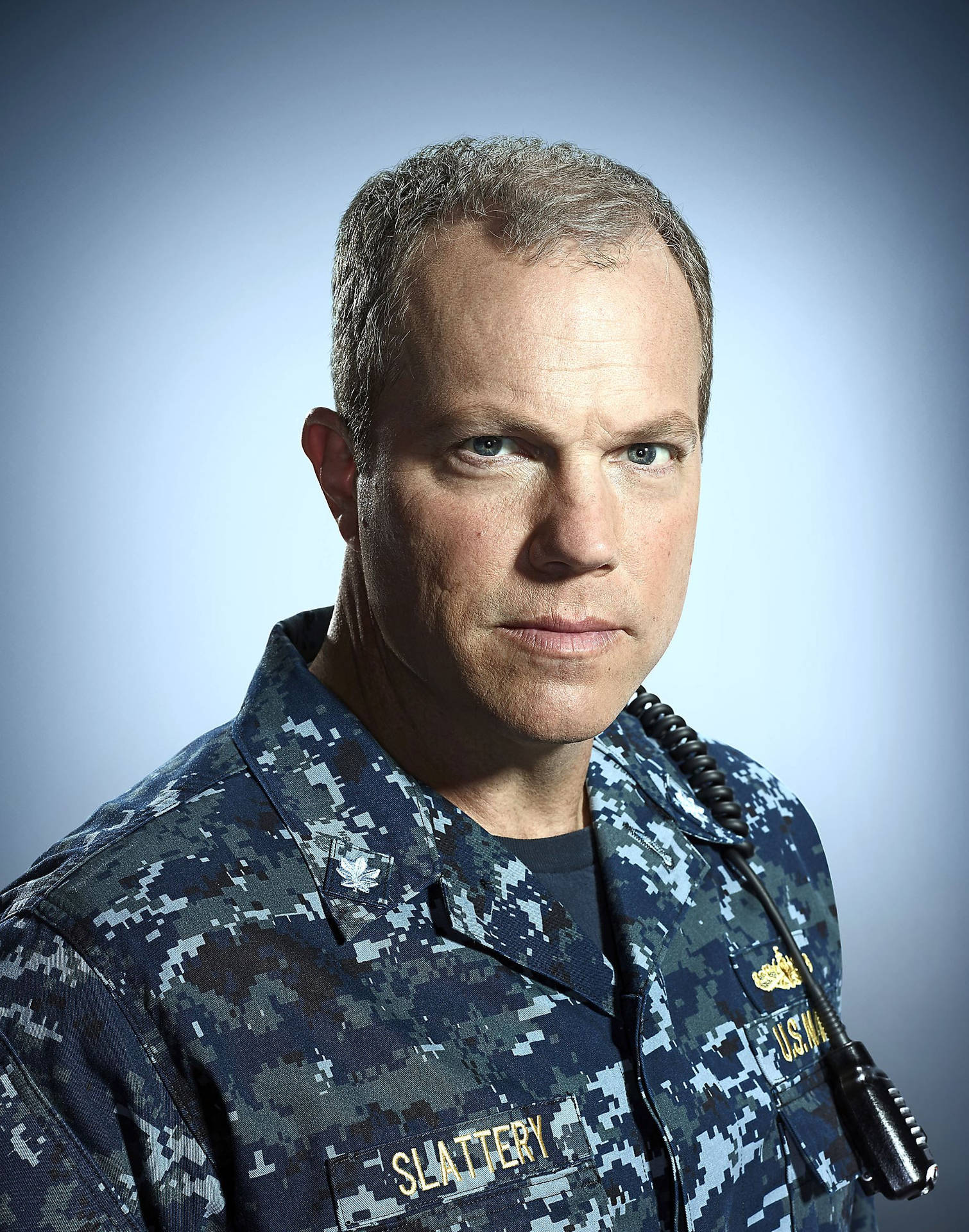 Adam Baldwin Depicting Character Slattery's Fatigue Background