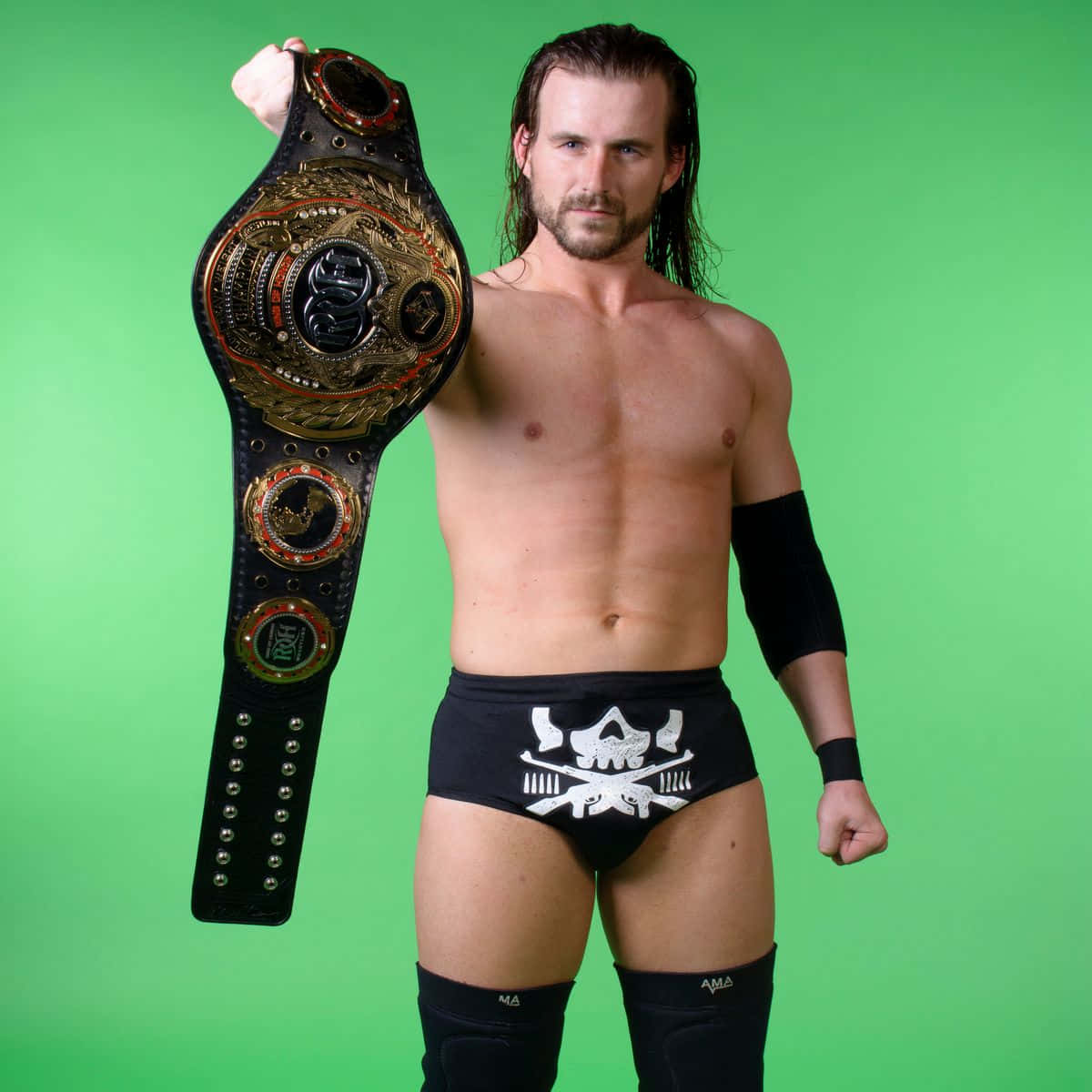 Adam Cole Holding His Championship Belt Background