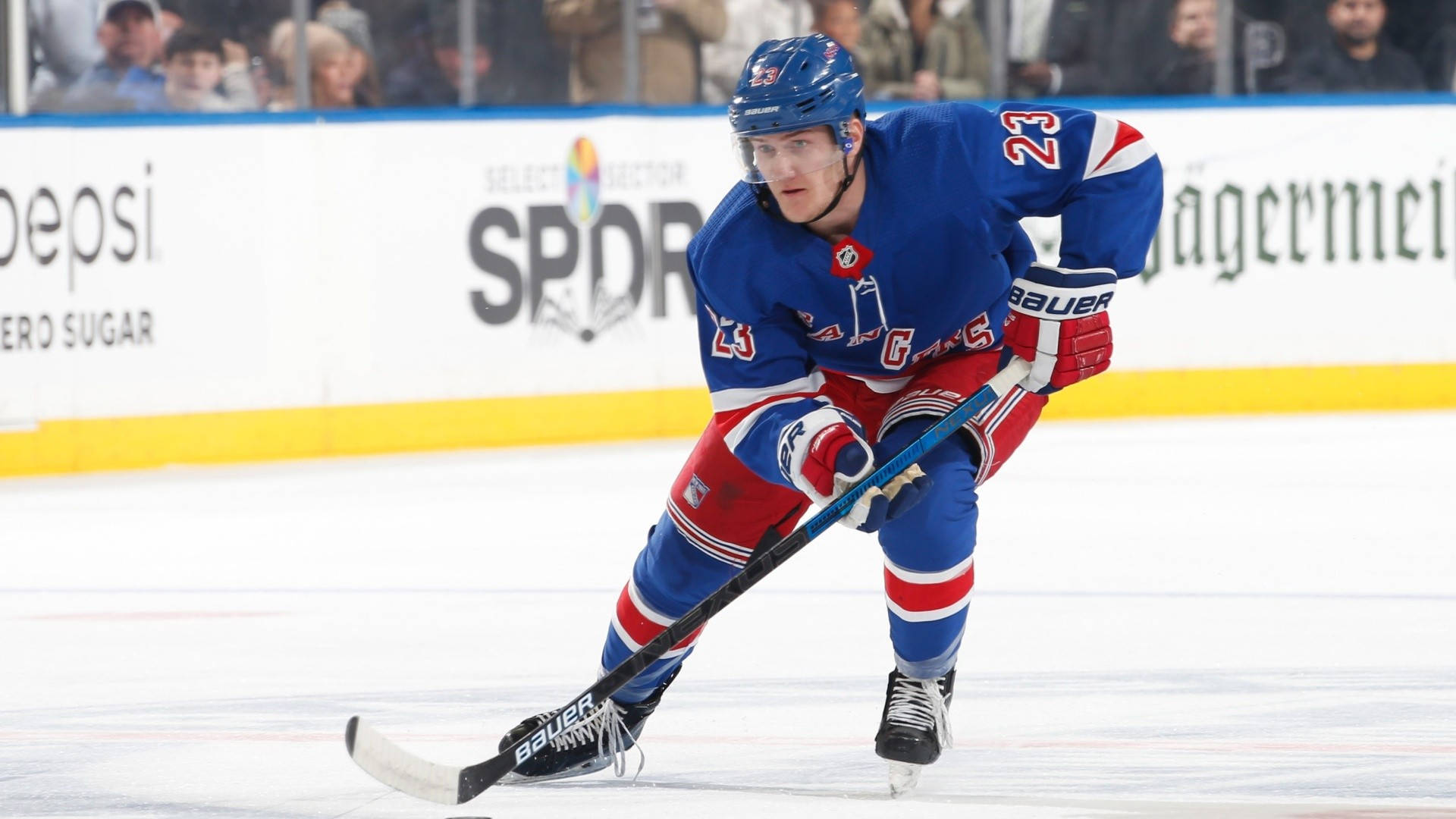 Adam Fox Blue New York Rangers Maneuvering Background