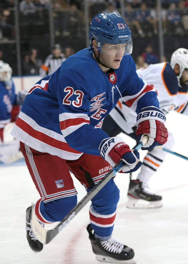 Adam Fox Blue New York Rangers Number 23 Background