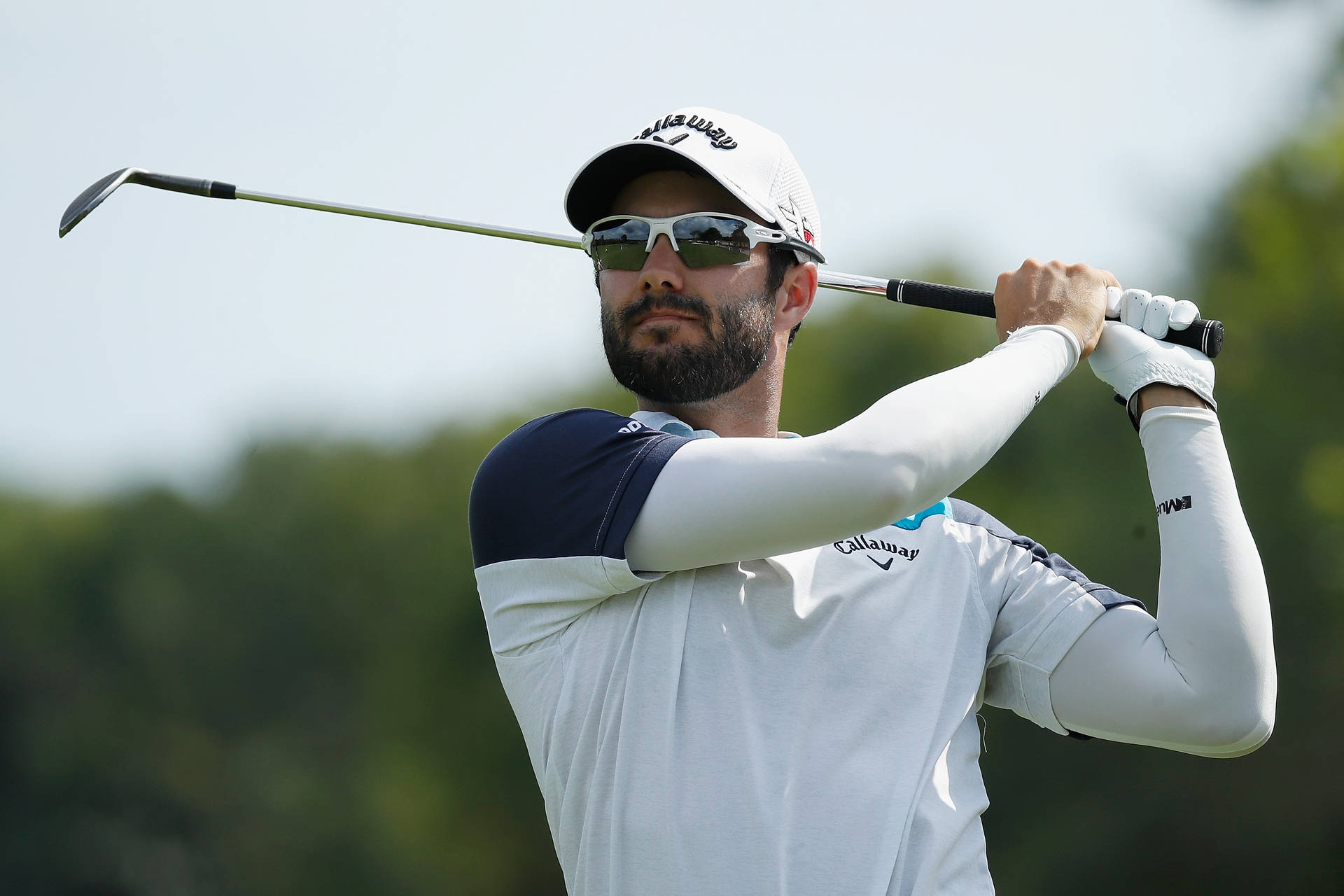 Adam Hadwin In Action On The Golf Course Background