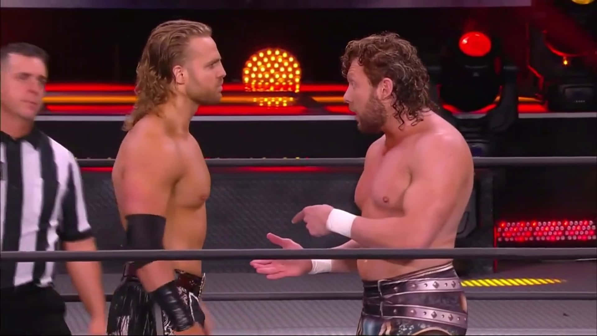 Adam Page And Kenny Omega Inside Aew Ring Background