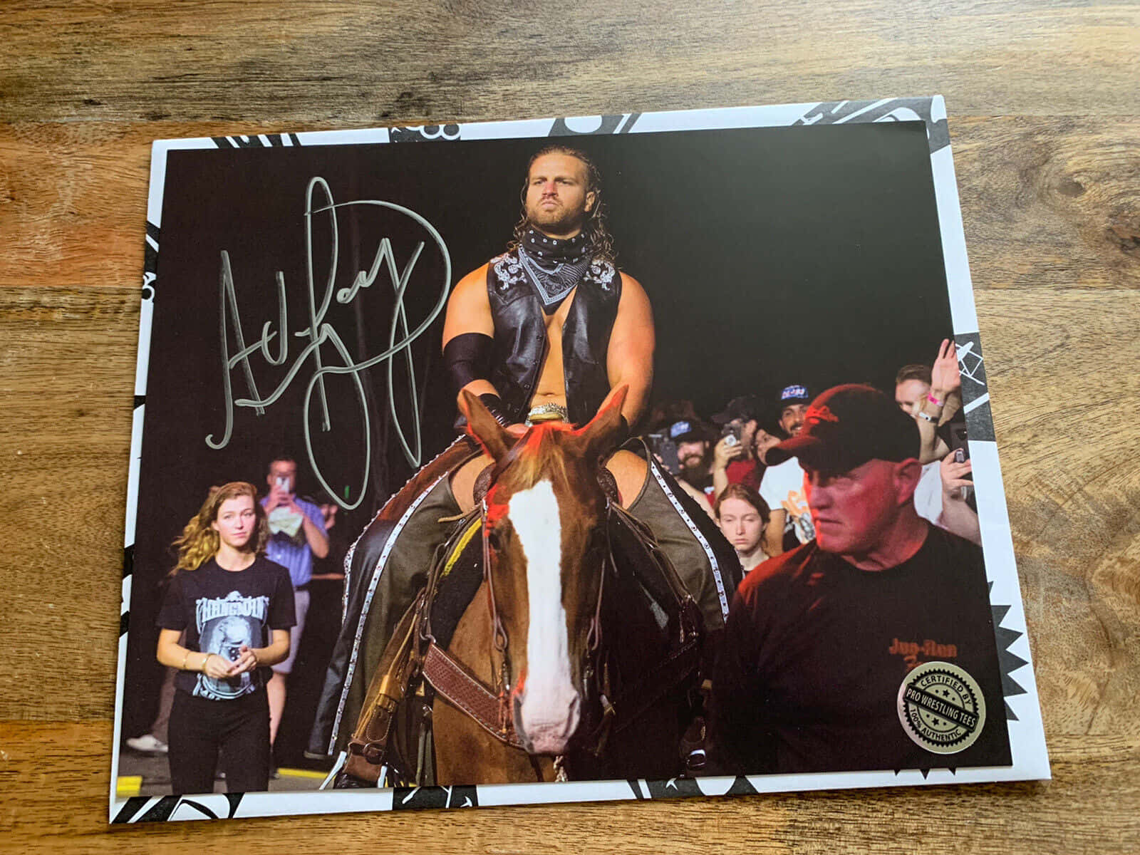Adam Page Riding Horse Background