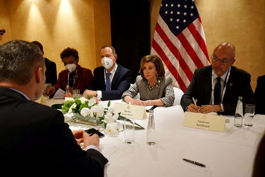 Adam Schiff Participating In A Committee Meeting Background
