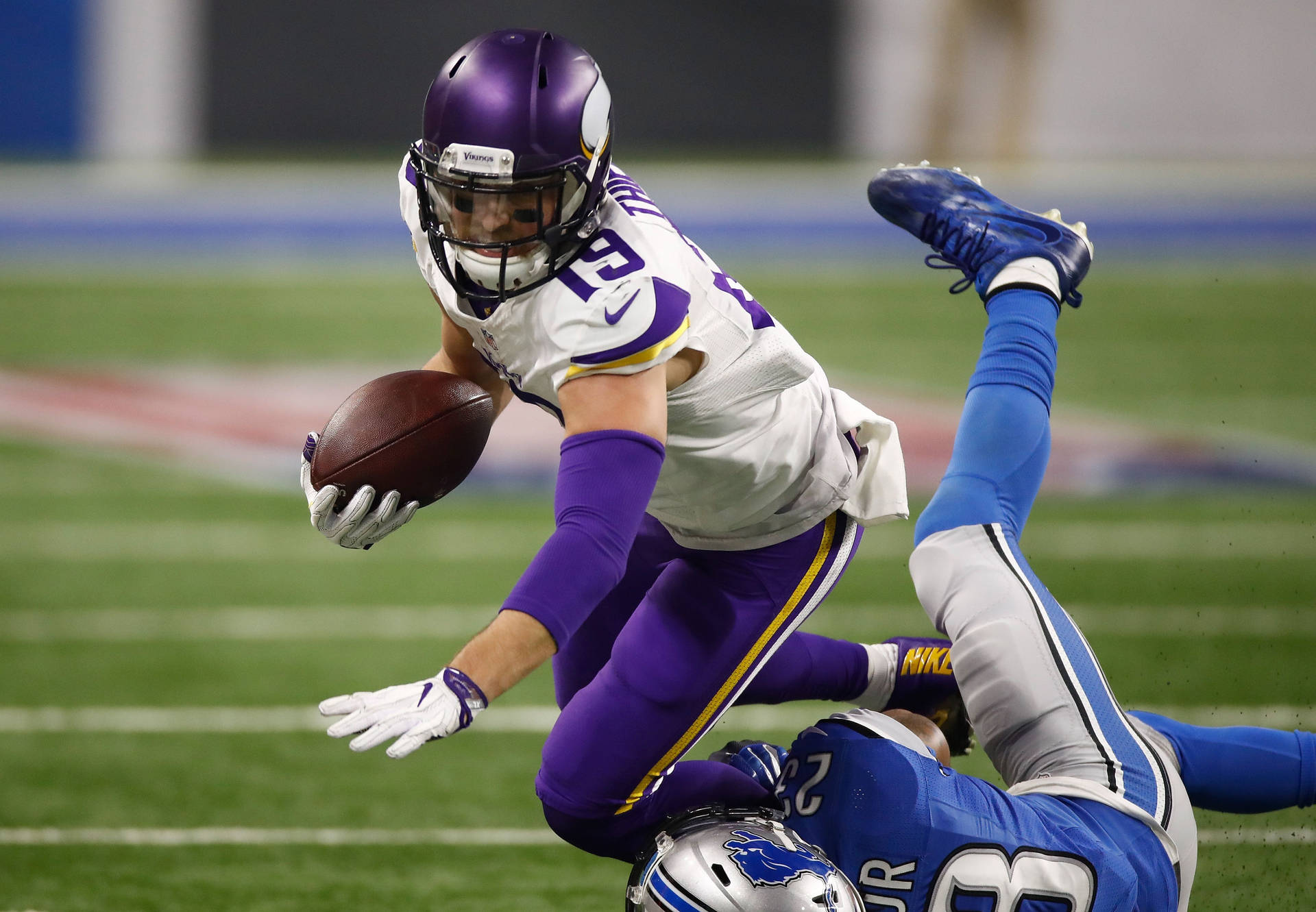 Adam Thielen Powerful Defense Background