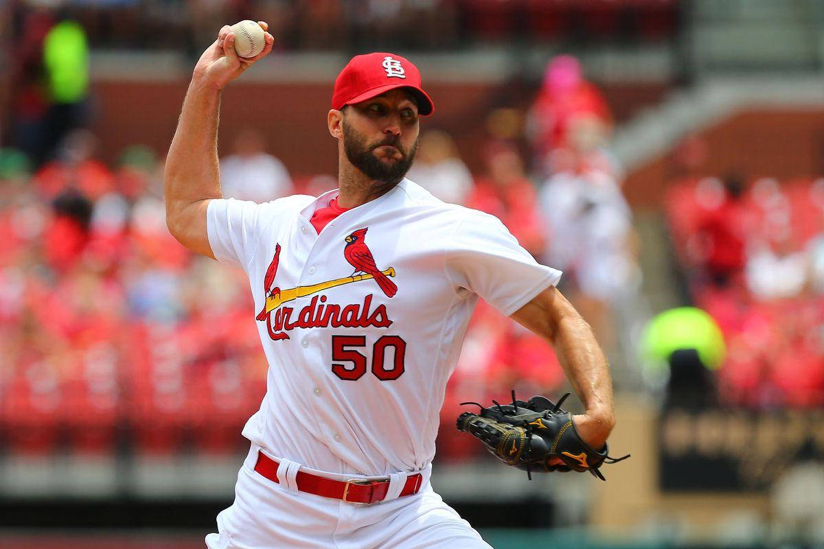 Adam Wainwright About To Throw Ball Background