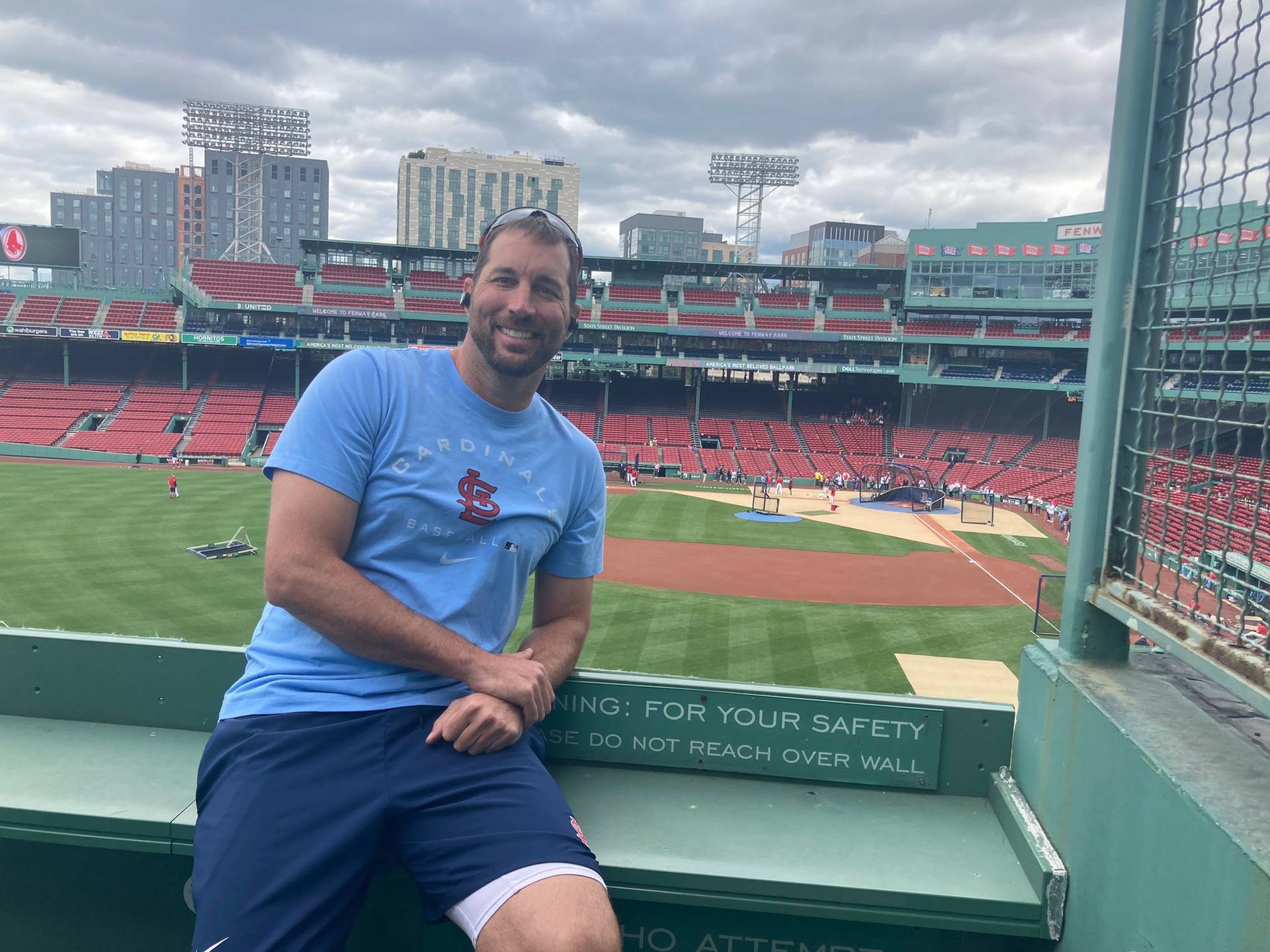 Adam Wainwright In Action On The Pitch Background