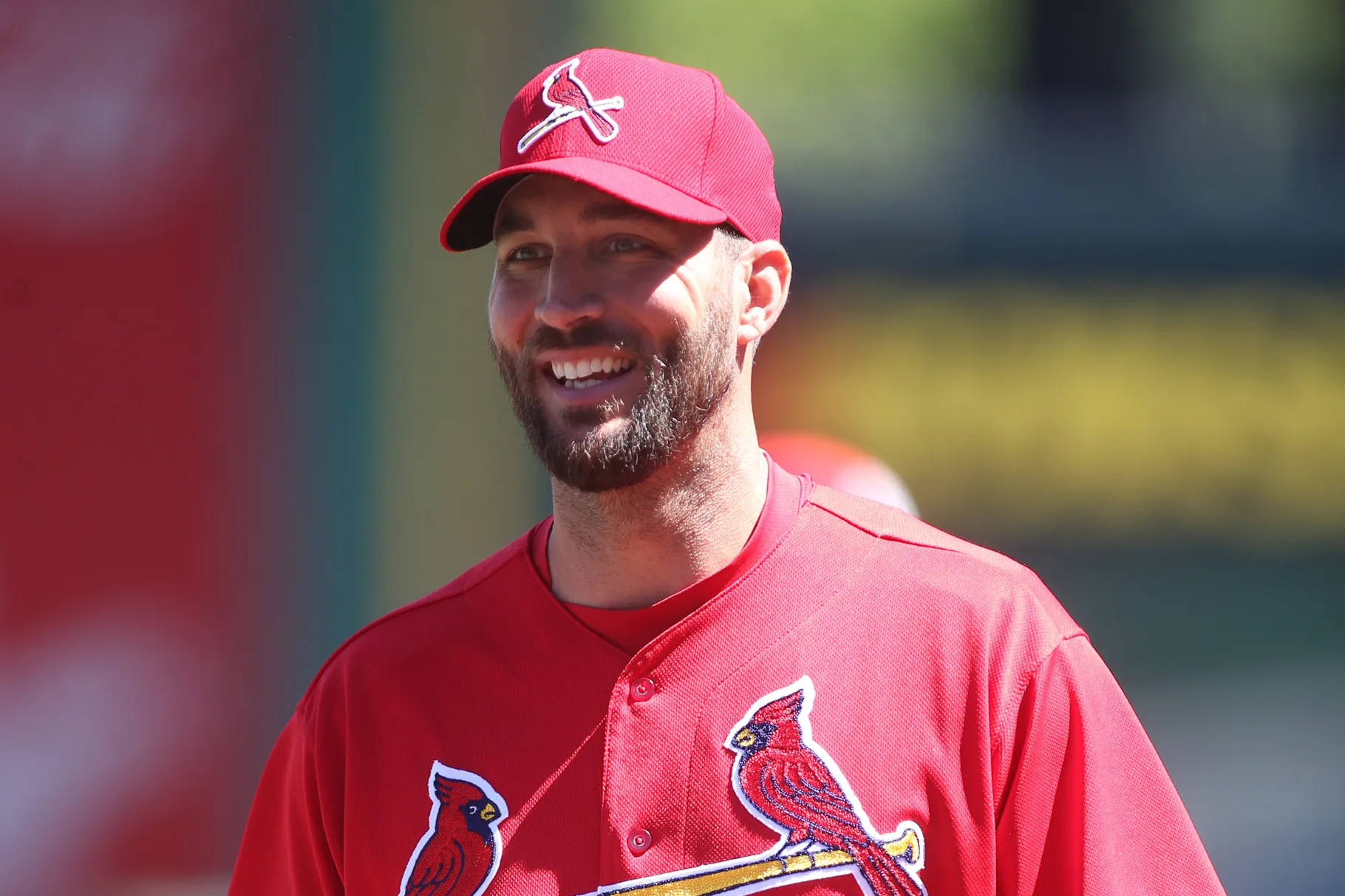 Adam Wainwright In His Vibrant Cardinals Jersey And Cap Background