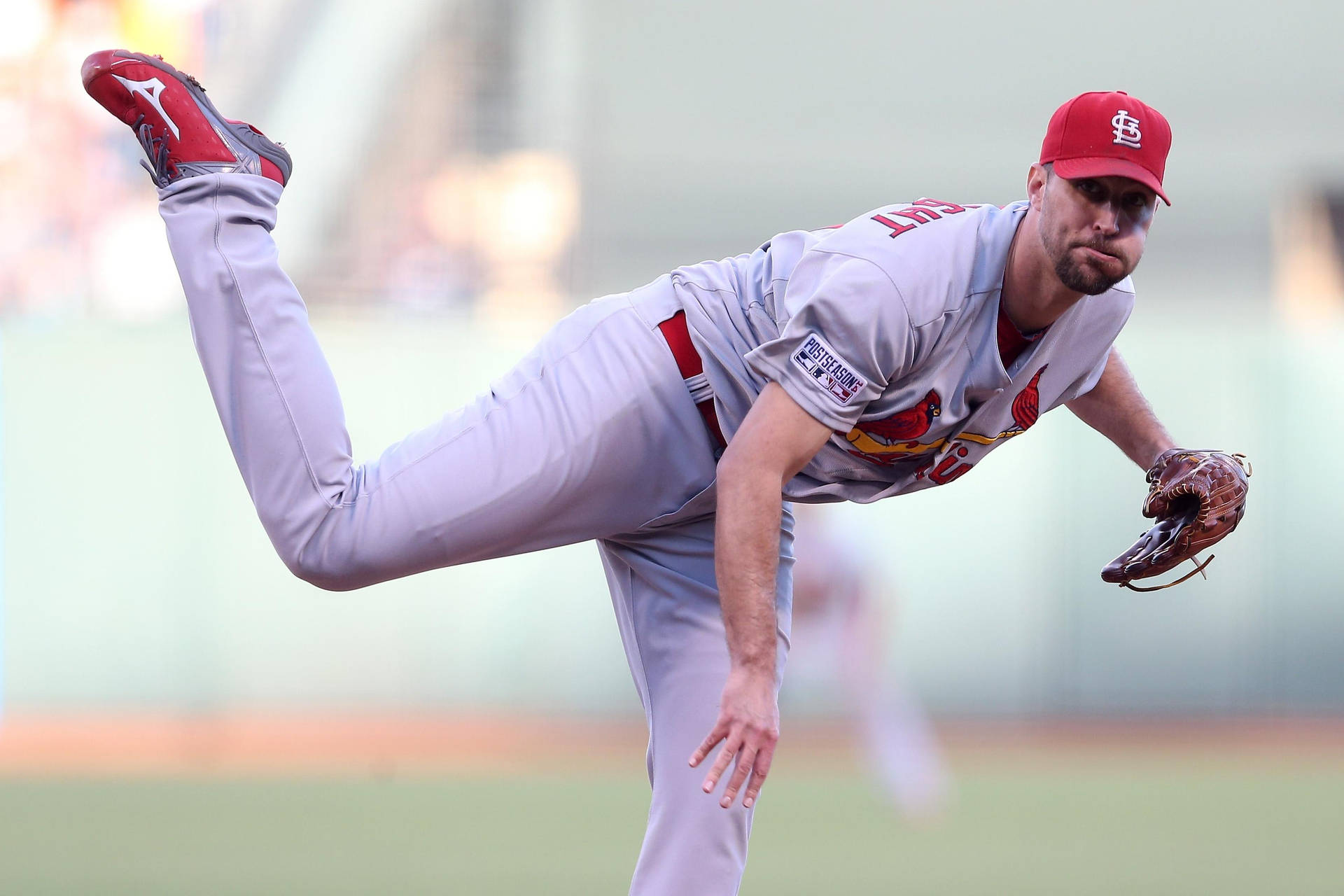 Adam Wainwright With Leg Raised Background