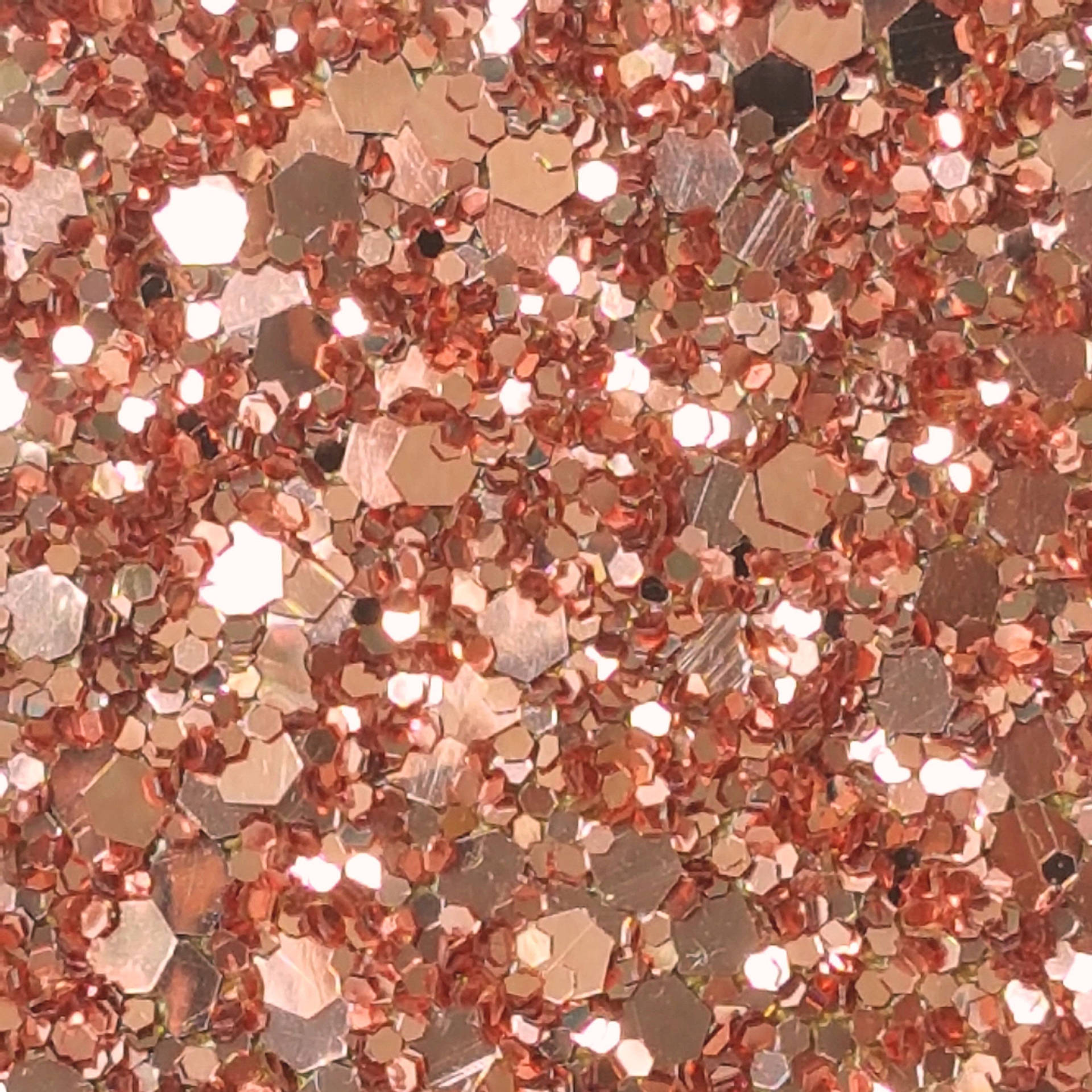 Add A Dramatic Touch To Your Outfit With Rose Gold Sequins Background