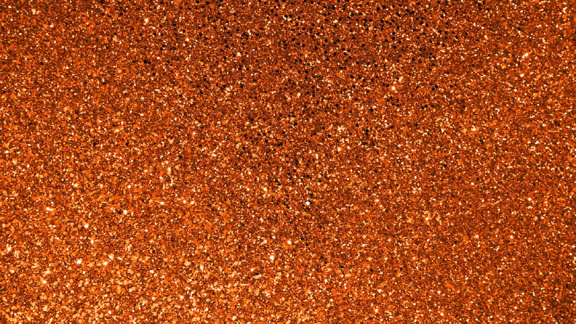 Add A Luxurious Sparkle To Your Space With Orange Glitter Background