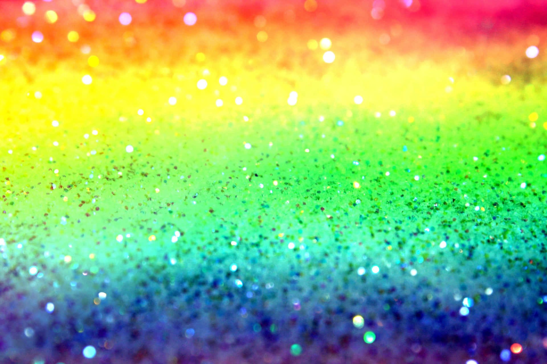 Add A Pop Of Colorful Sparkle To Your Space With Rainbow Glitter. Background