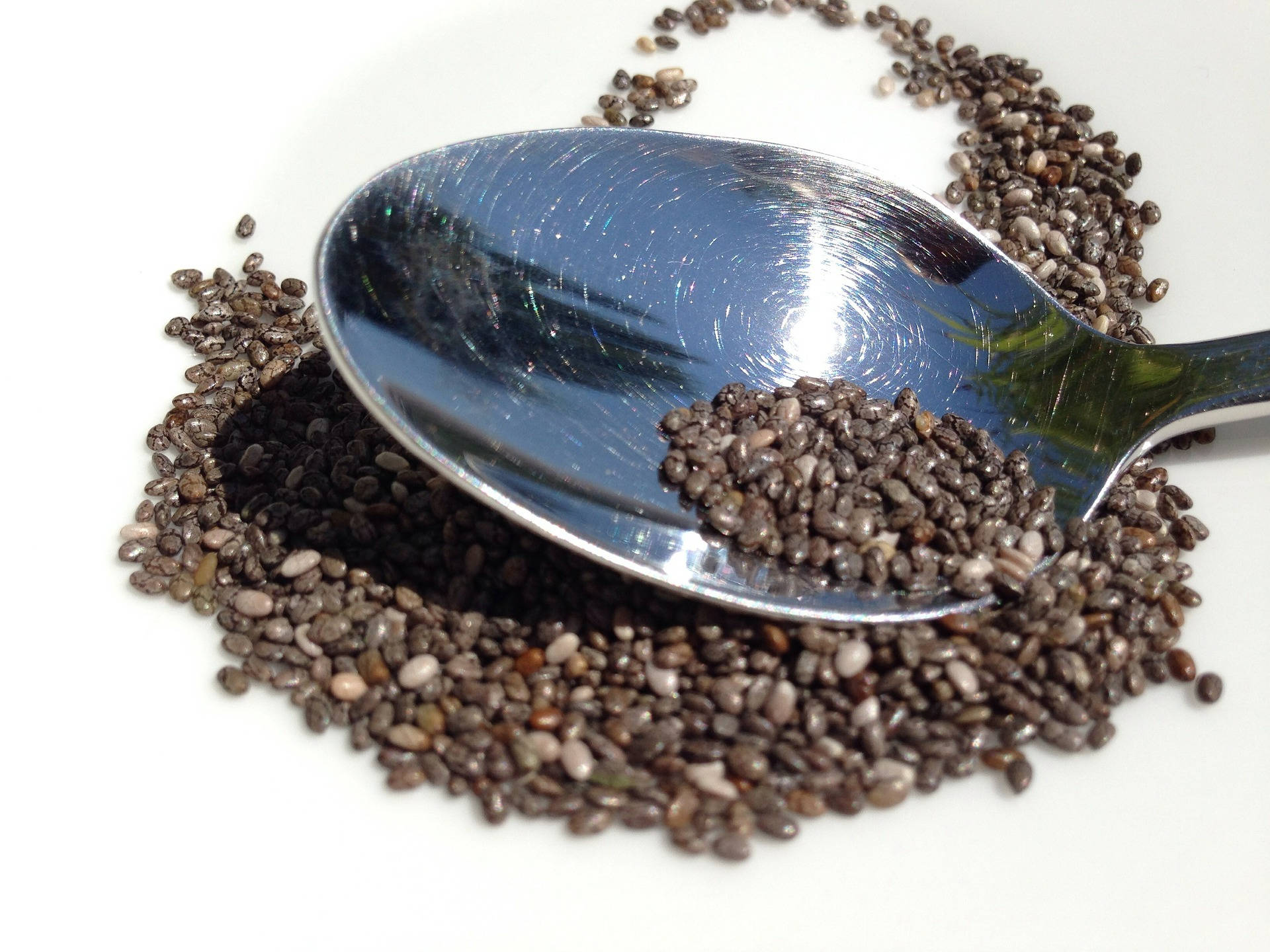 Adding Chia Seeds To The Pile Background