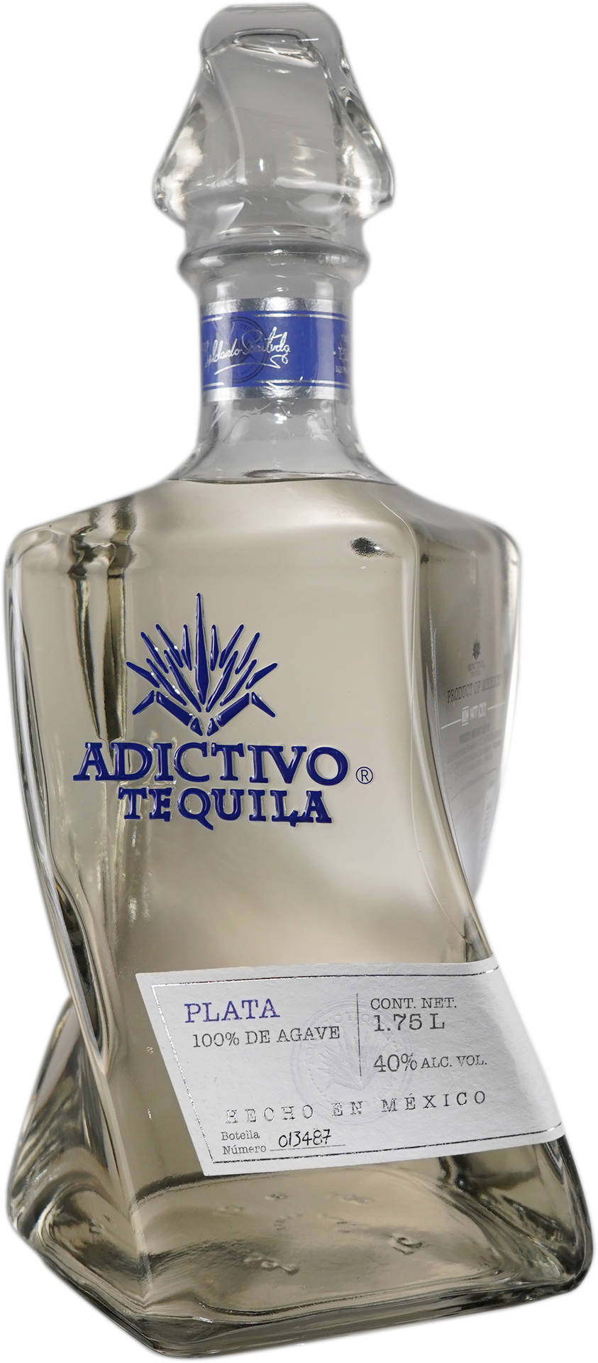 Adictivo Plata Tequila In A Clear Bottle Background