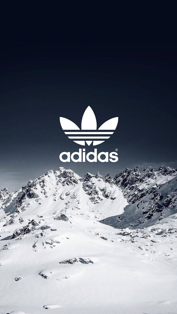 Adidas Brand On Snow Mountains Background