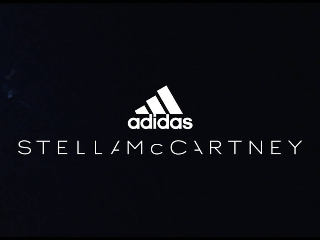 Adidas With Stella Mccartney Designer Logo Background