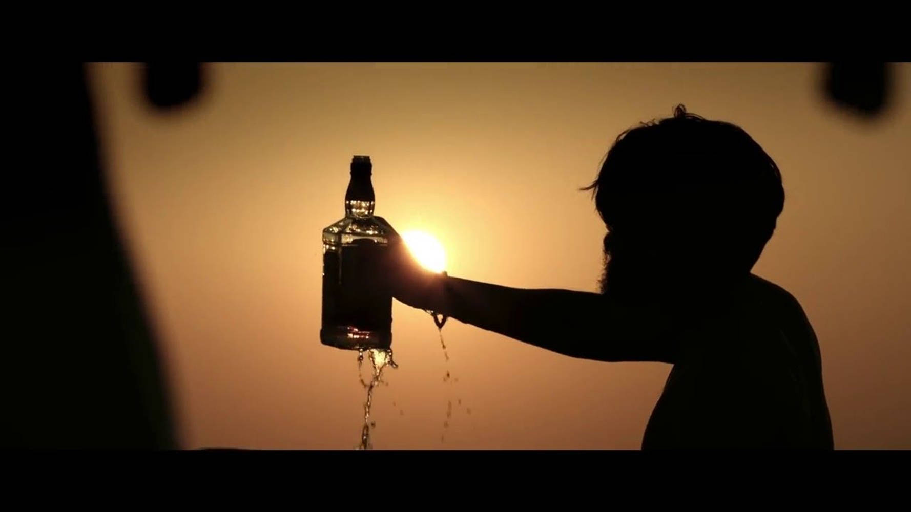 Adithya Varma Contemplation Scene With A Drink