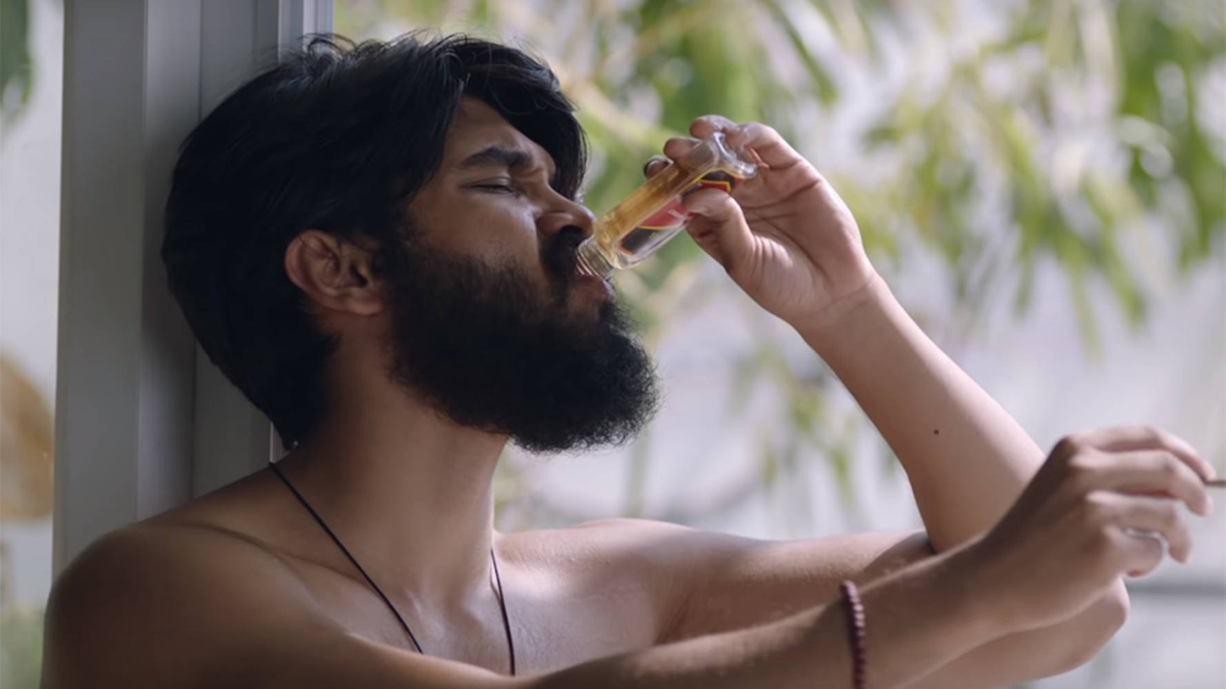 Adithya Varma Drinking While Topless Background