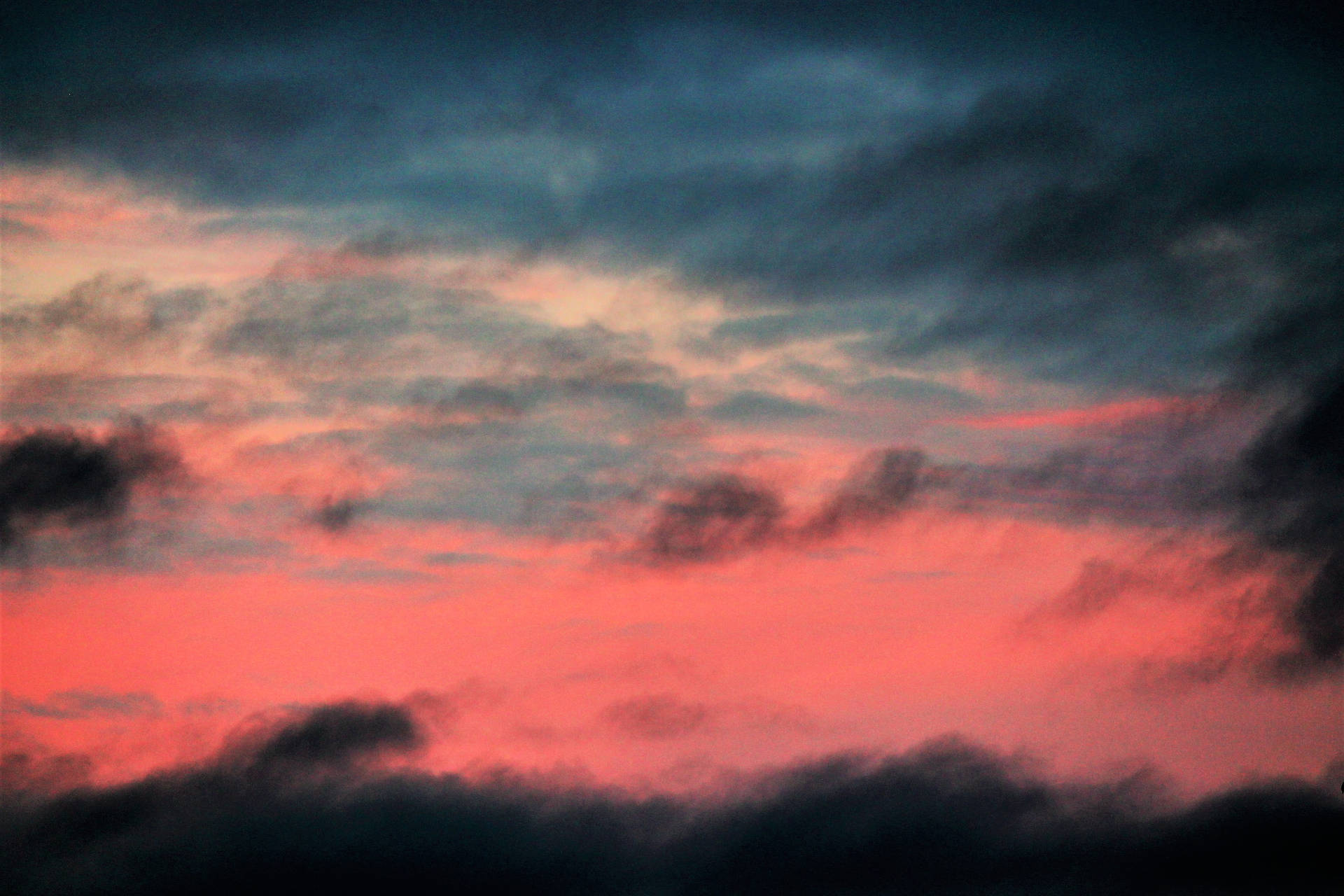 Admire The Beauty Of Ombre In A Stormy Red Sky Background