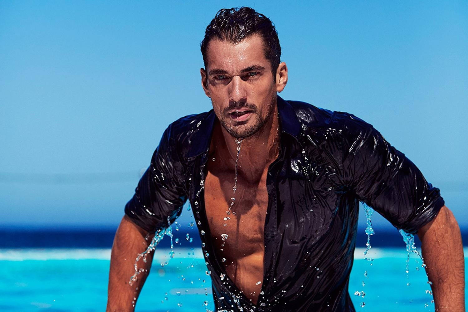 Adonis Ablaze: A Seductive Wet Look Background