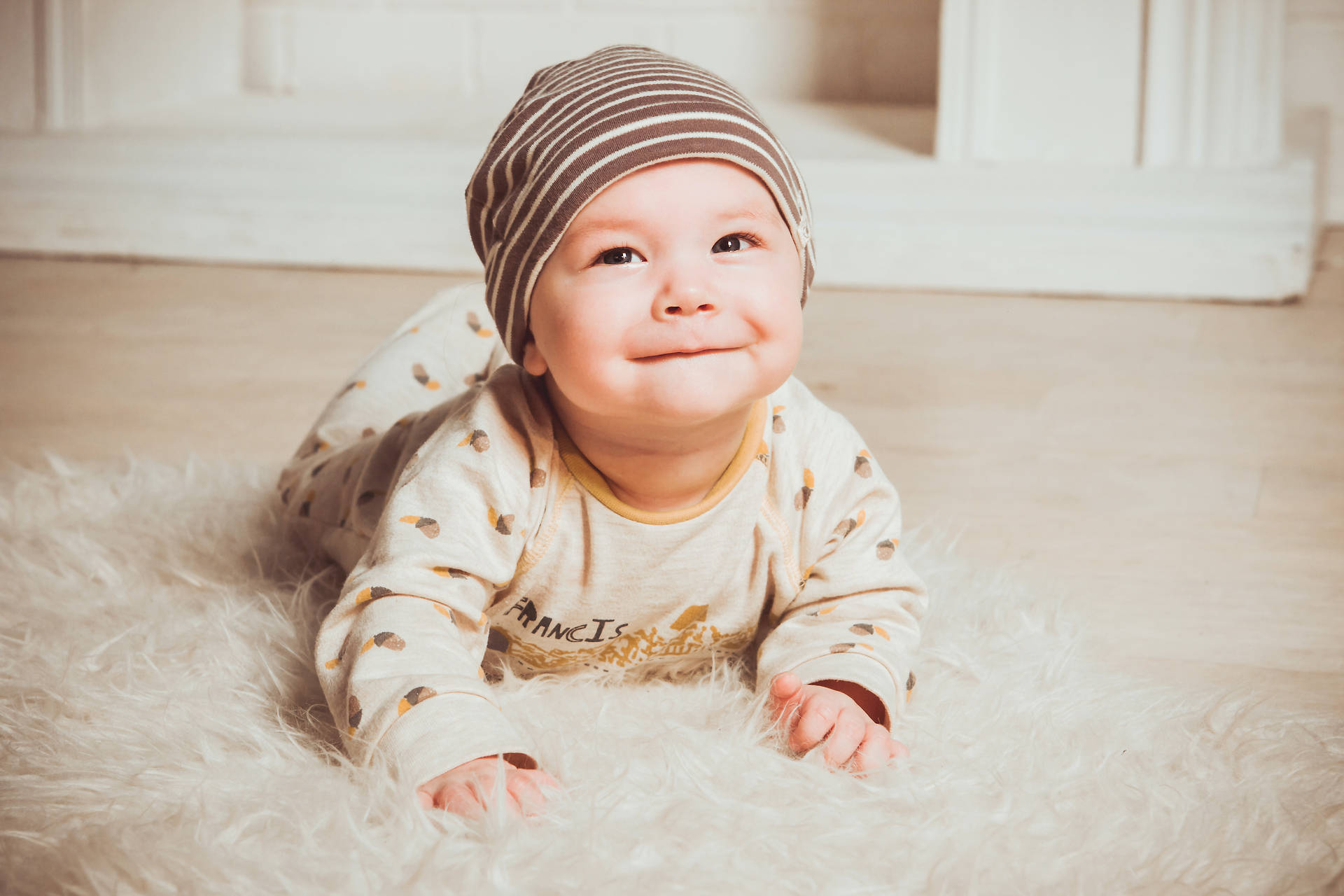Adorable Baby With A Mischievous Smile