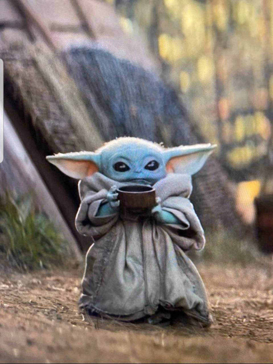 Adorable Baby Yoda With Tea Background