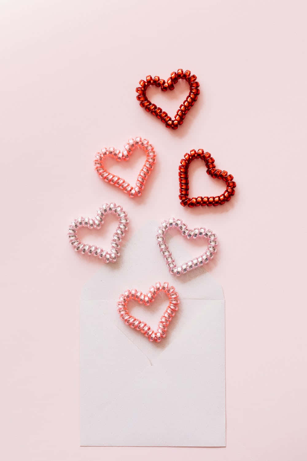 Adorable Colorful Coil Heart Aesthetic Valentine's Day Background