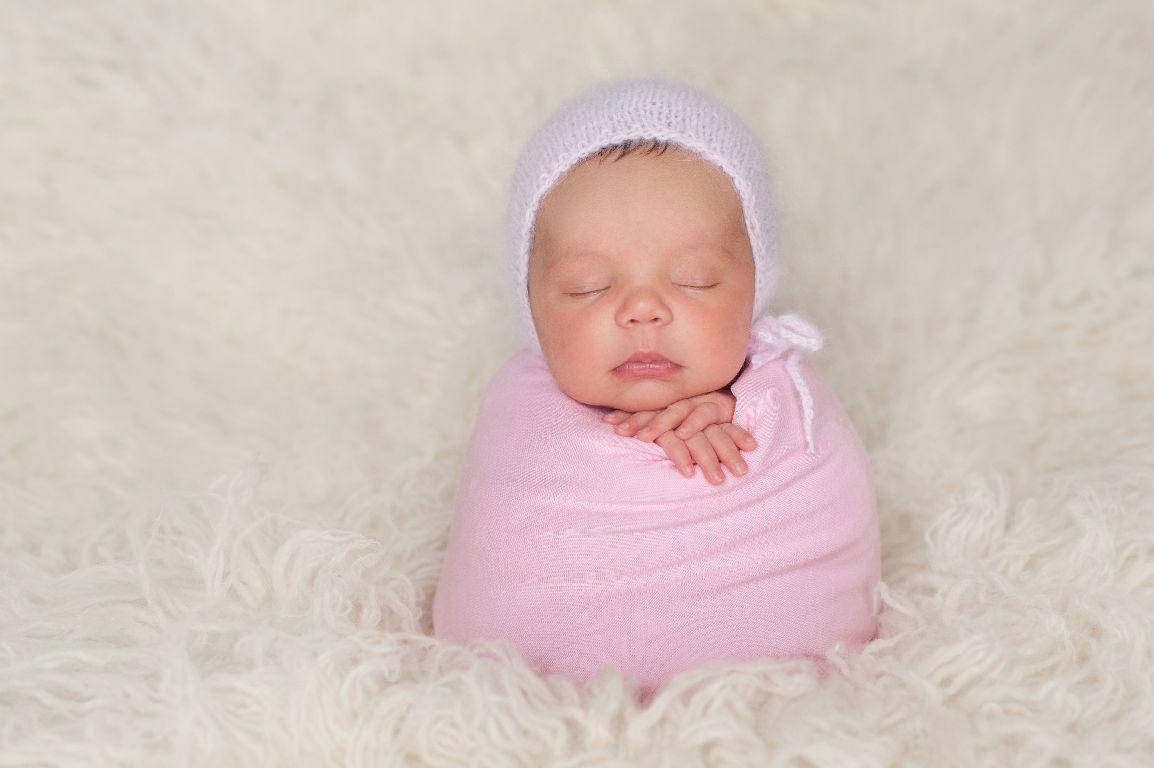 Adorable Newborn Baby Sleeping Peacefully