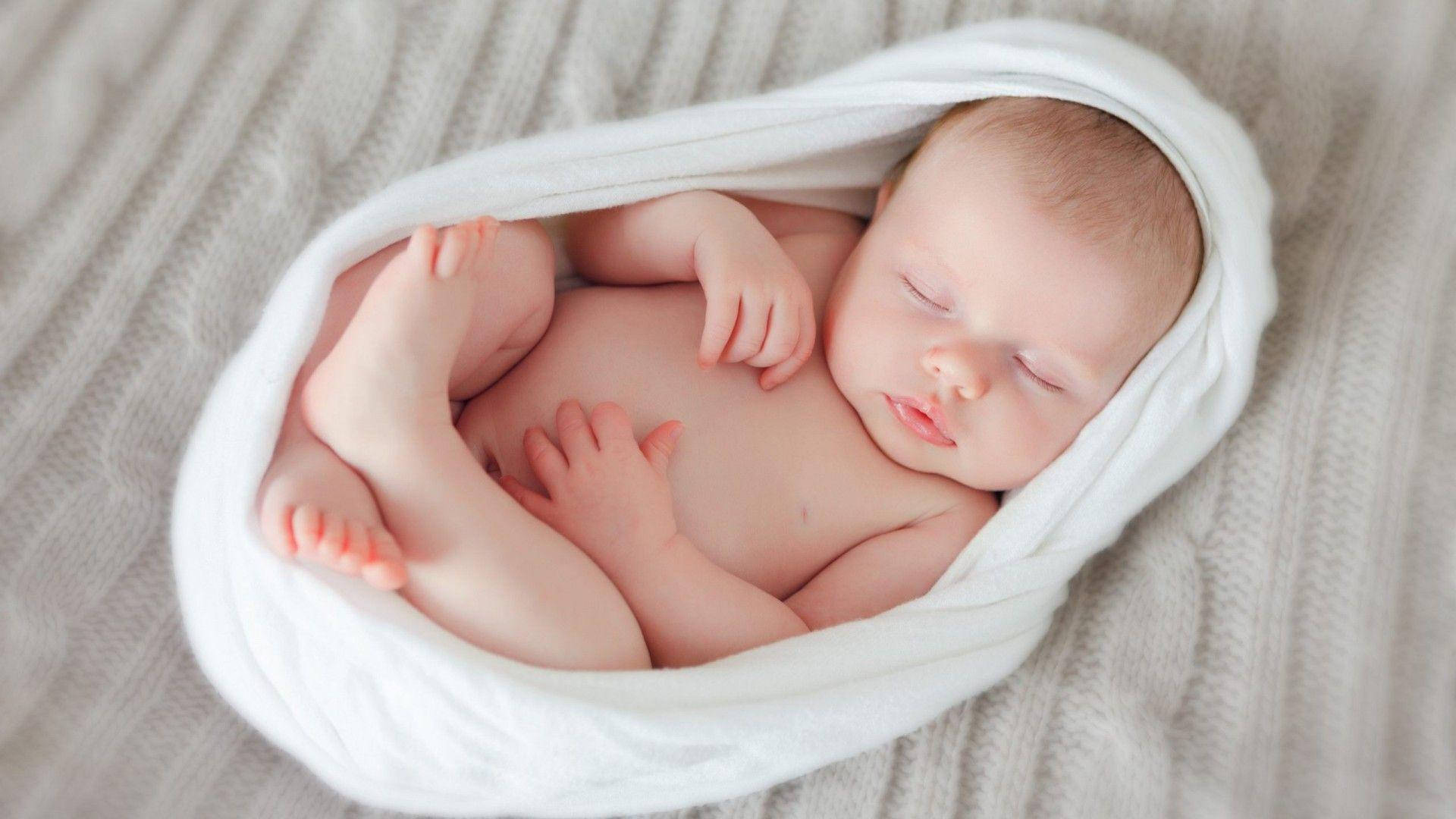 Adorable Newborn Baby Sleeping Peacefully