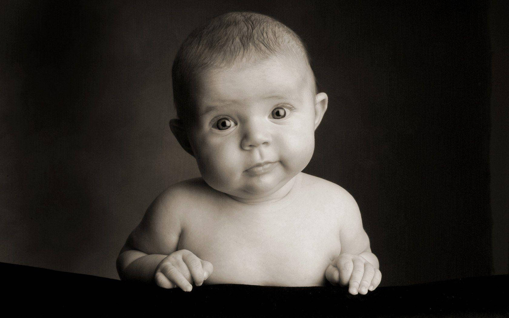 Adorable Newborn Baby Wrapped In Soft Blanket Background