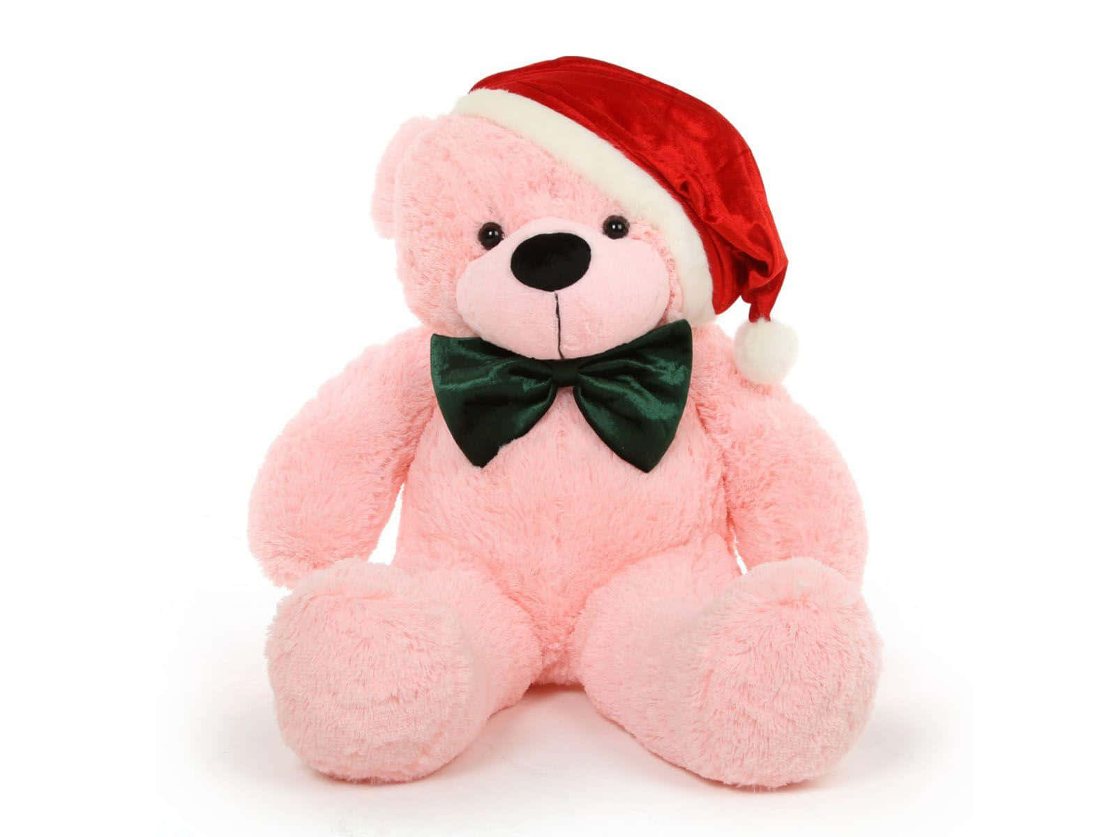 Adorable Pink Teddy Bear Festively Adorned For Christmas Background